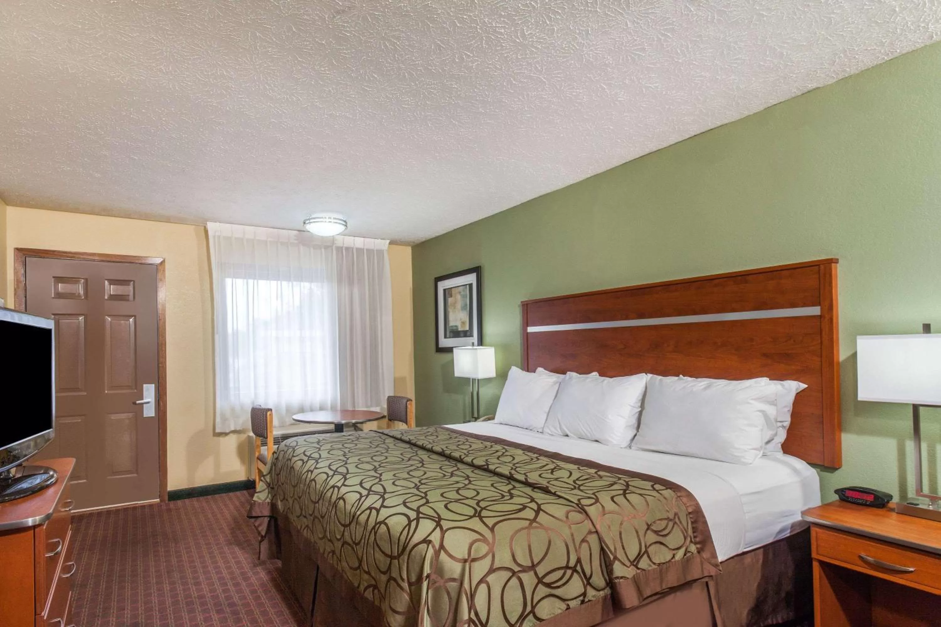Photo of the whole room, Bed in Baymont by Wyndham Pigeon Forge near Island Drive