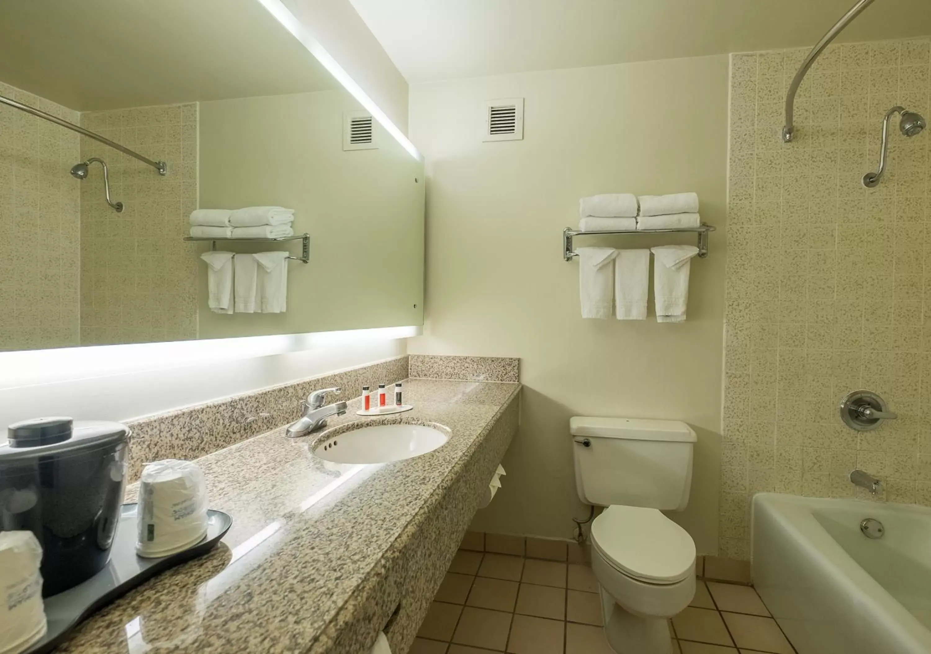 Bathroom in Howard Johnson by Wyndham Fullerton/Anaheim Conference Cntr