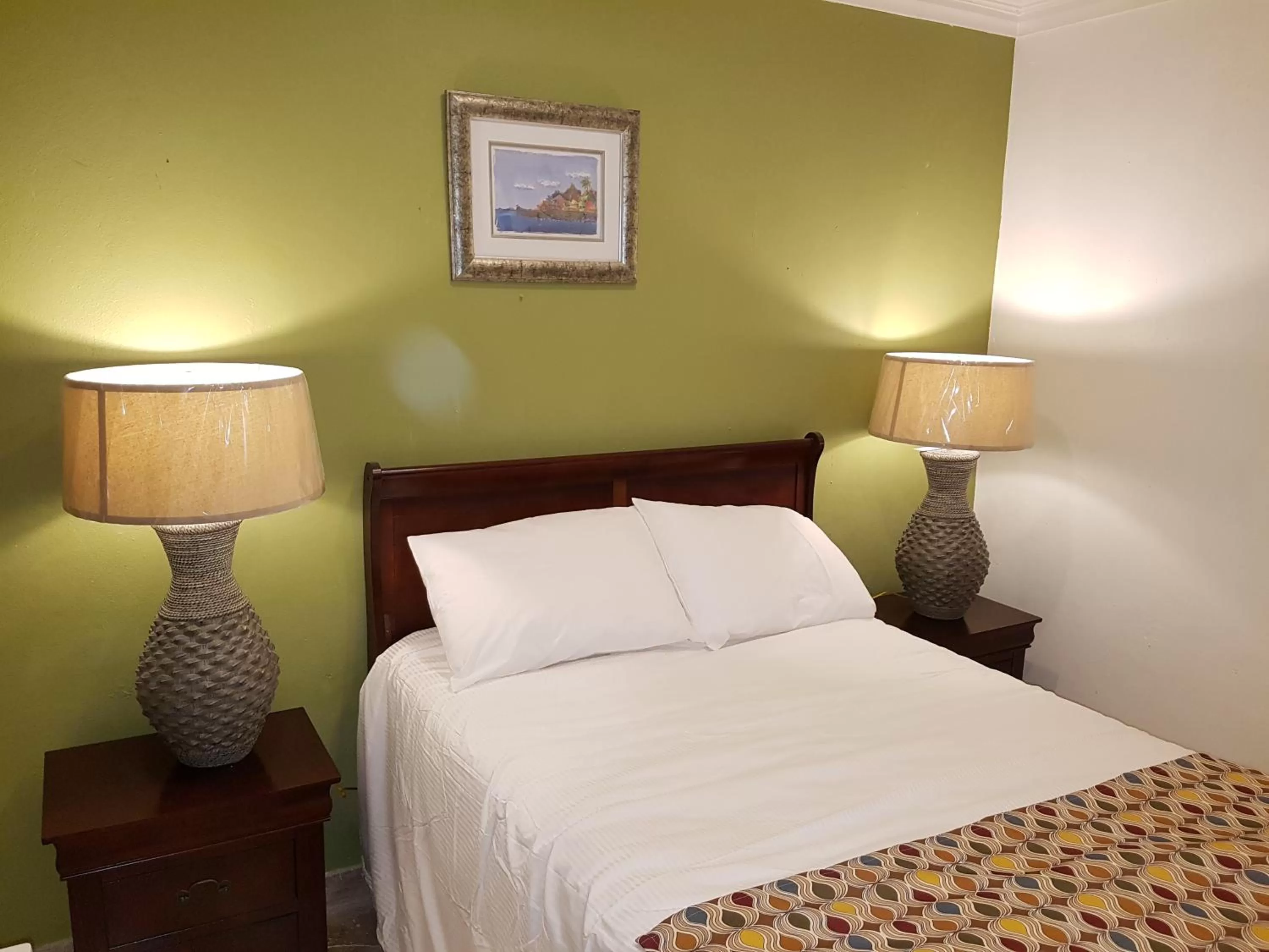 Bed in Golden Palm B & B