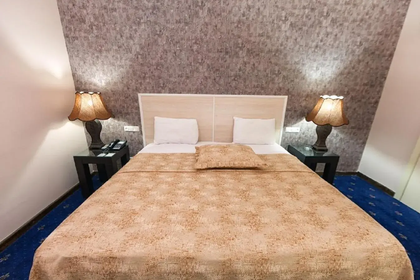 Bed in Regineh Hotel