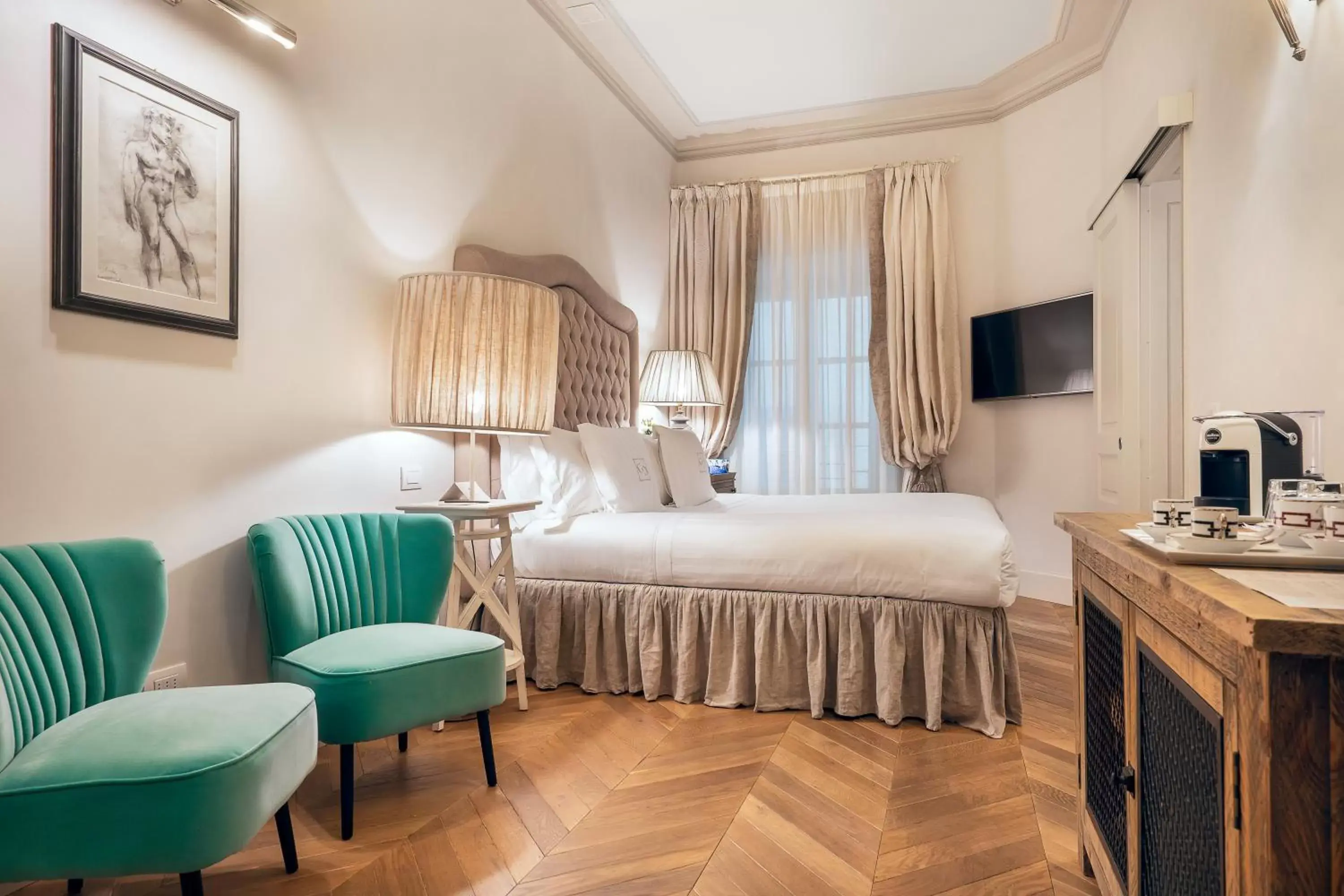 Photo of the whole room in Corte Calzaiuoli Elegant Suites