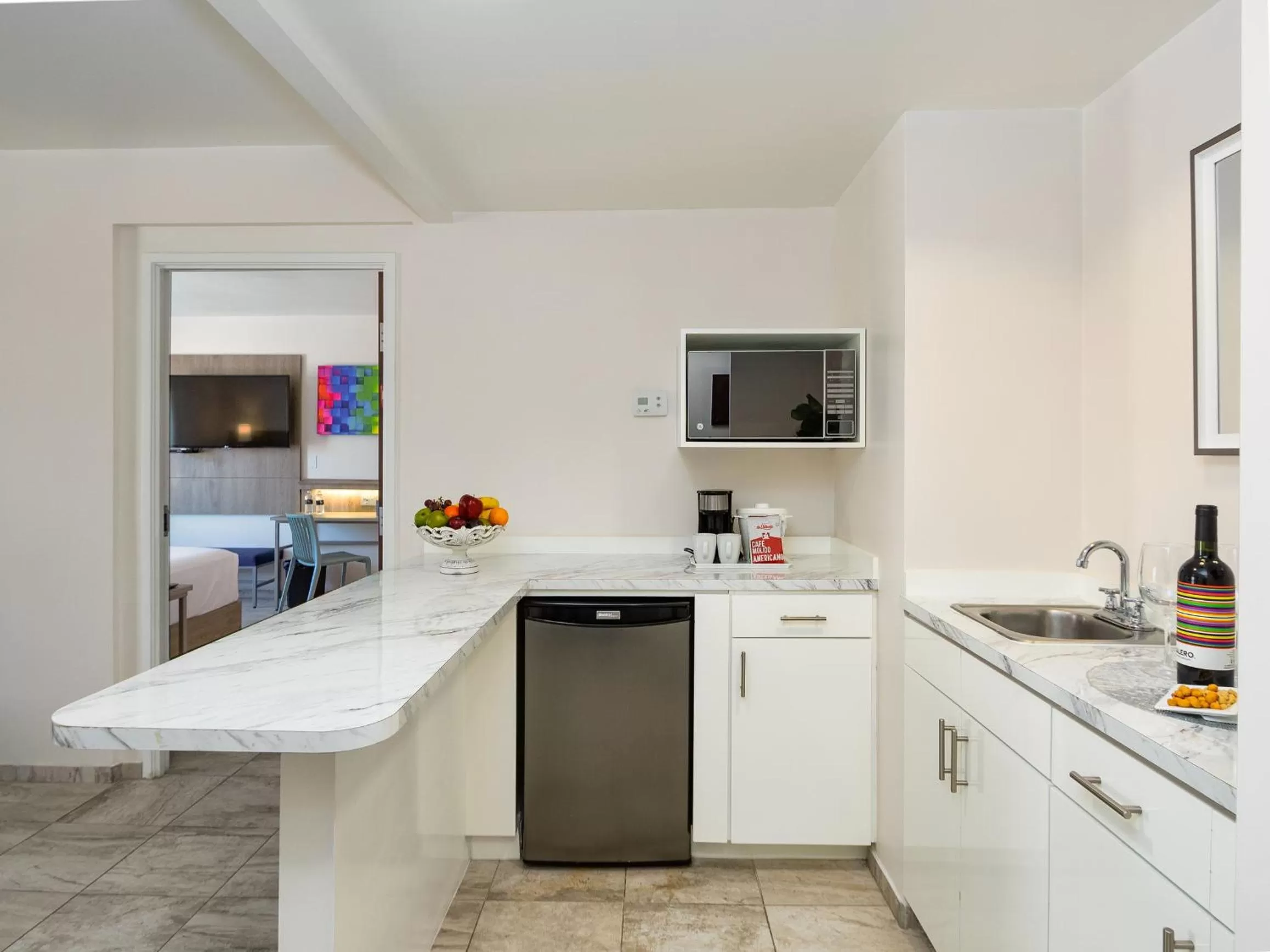 Kitchen/Kitchenette in Hotel Mesaluna Near American Consulate