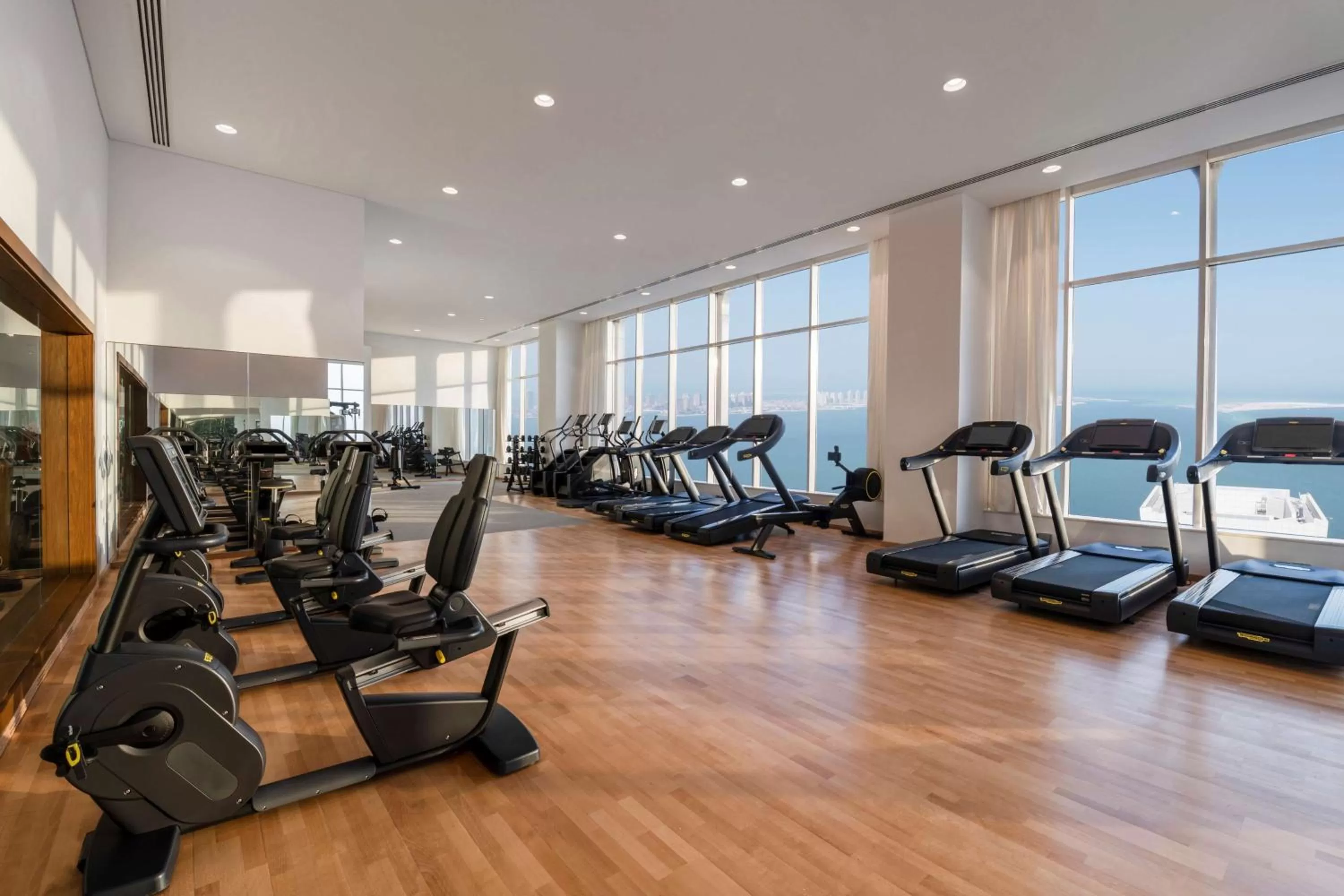 Fitness centre/facilities in Aleph Doha Residences, Curio Collection By Hilton