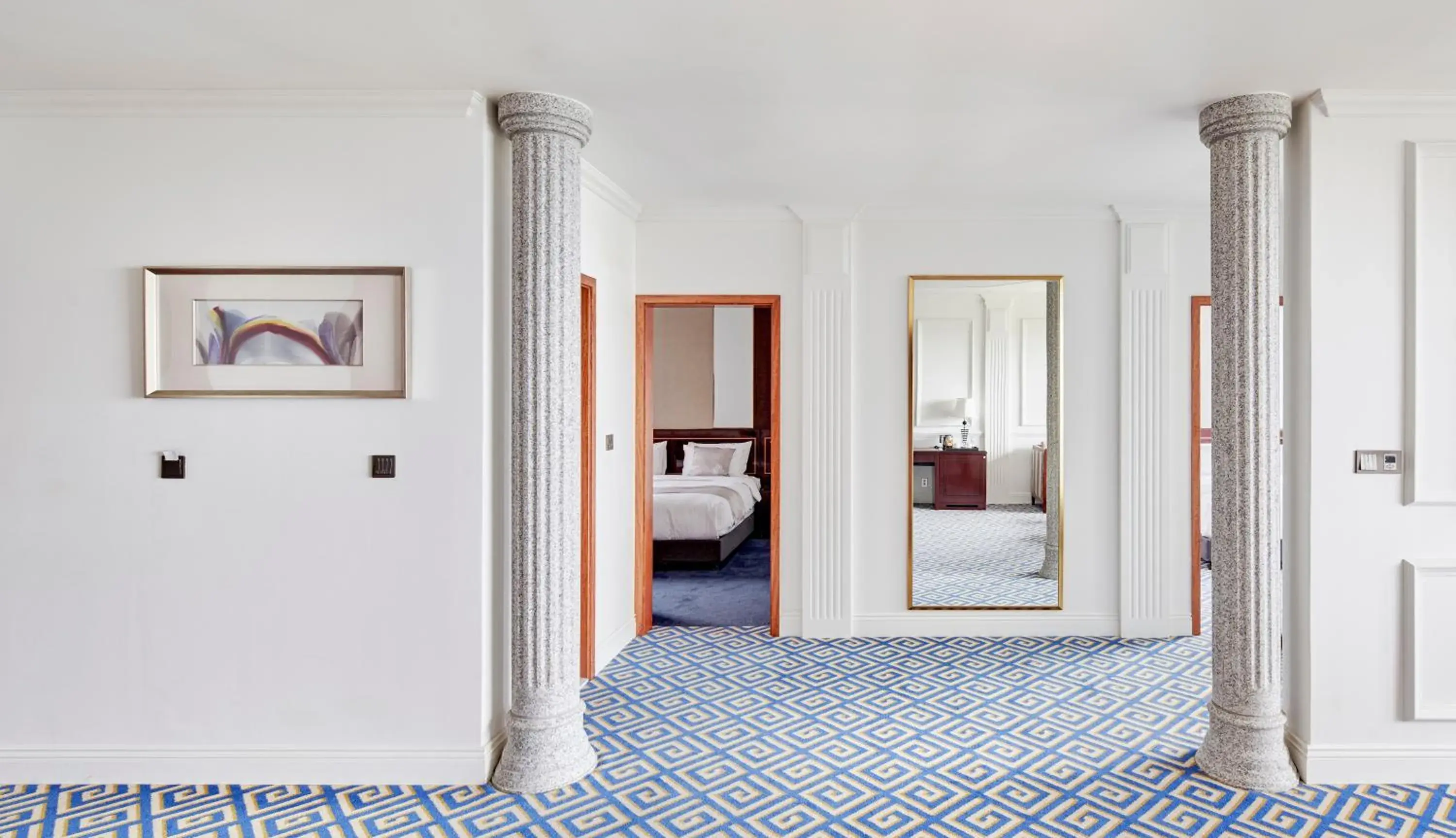 Bed in GoldOne Hotel & Suites Bed in GoldOne Hotel & Suites