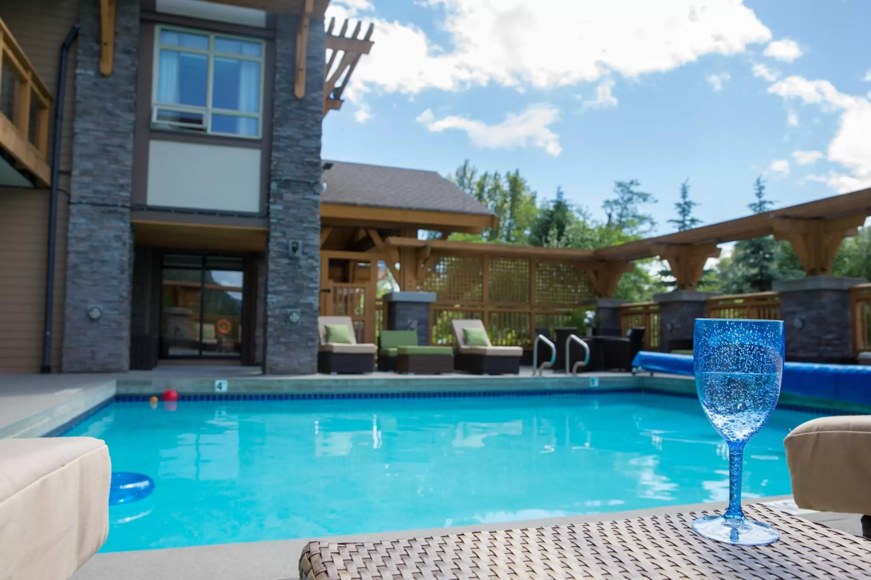 Staff, Swimming Pool in Executive Suites Hotel and Resort, Squamish