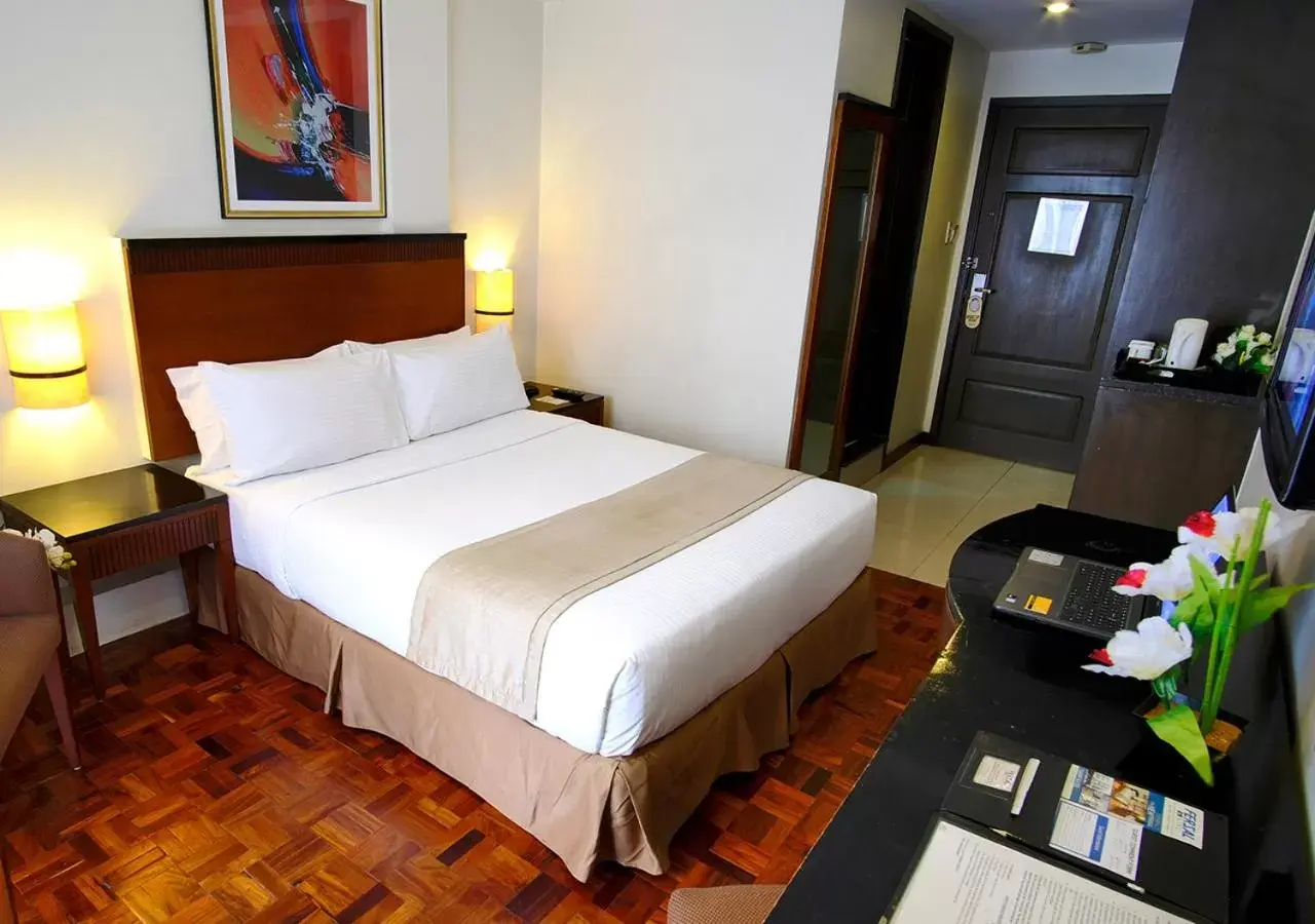 Bed in Fersal Hotel Neptune Makati