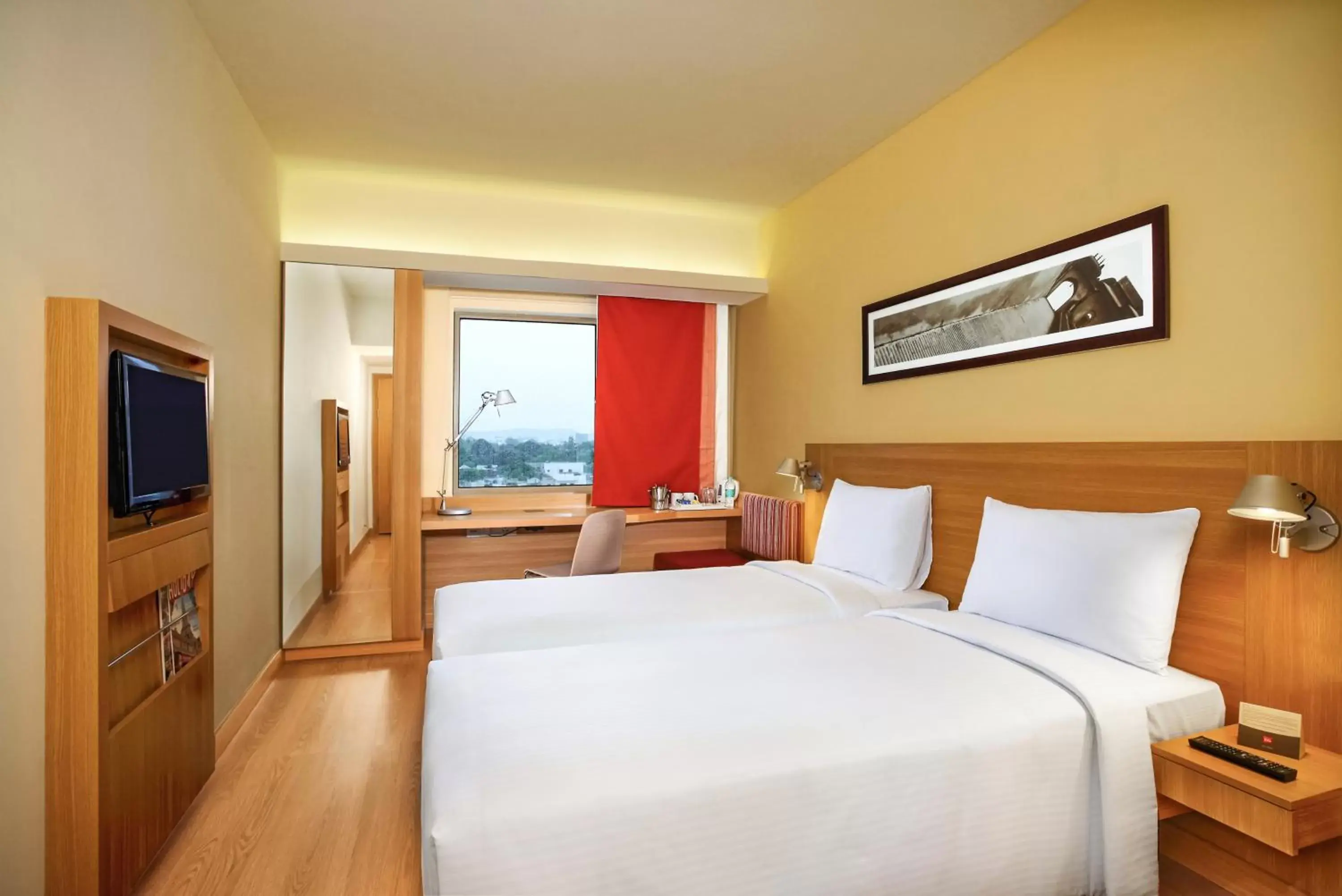 Photo of the whole room, Bed in ibis Hyderabad Hitec City - An Accor Brand