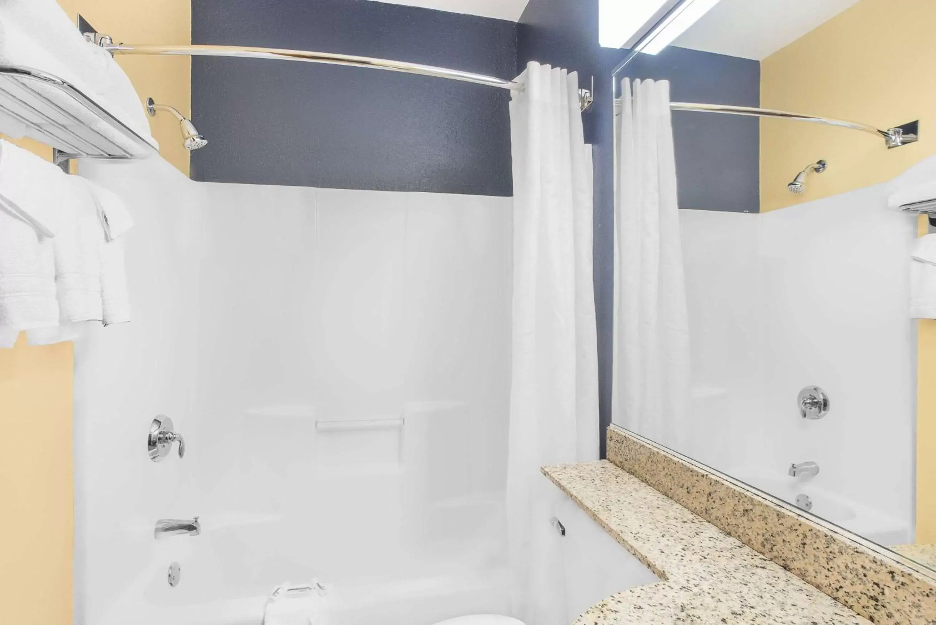 Bathroom in Microtel Inn & Suites Chili/Rochester Bathroom in Microtel Inn & Suites Chili/Rochester