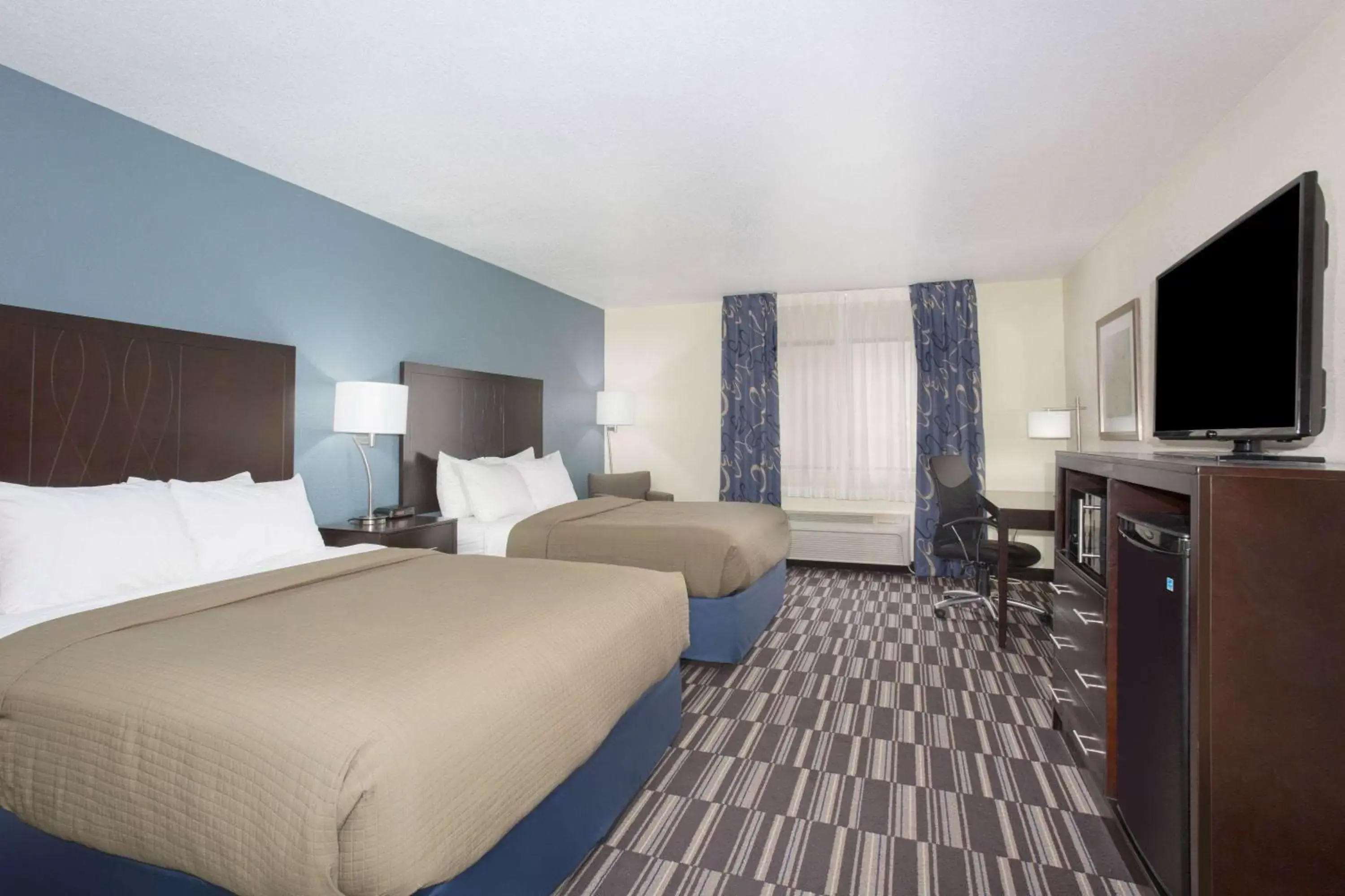 Photo of the whole room in AmericInn by Wyndham Mount Pleasant