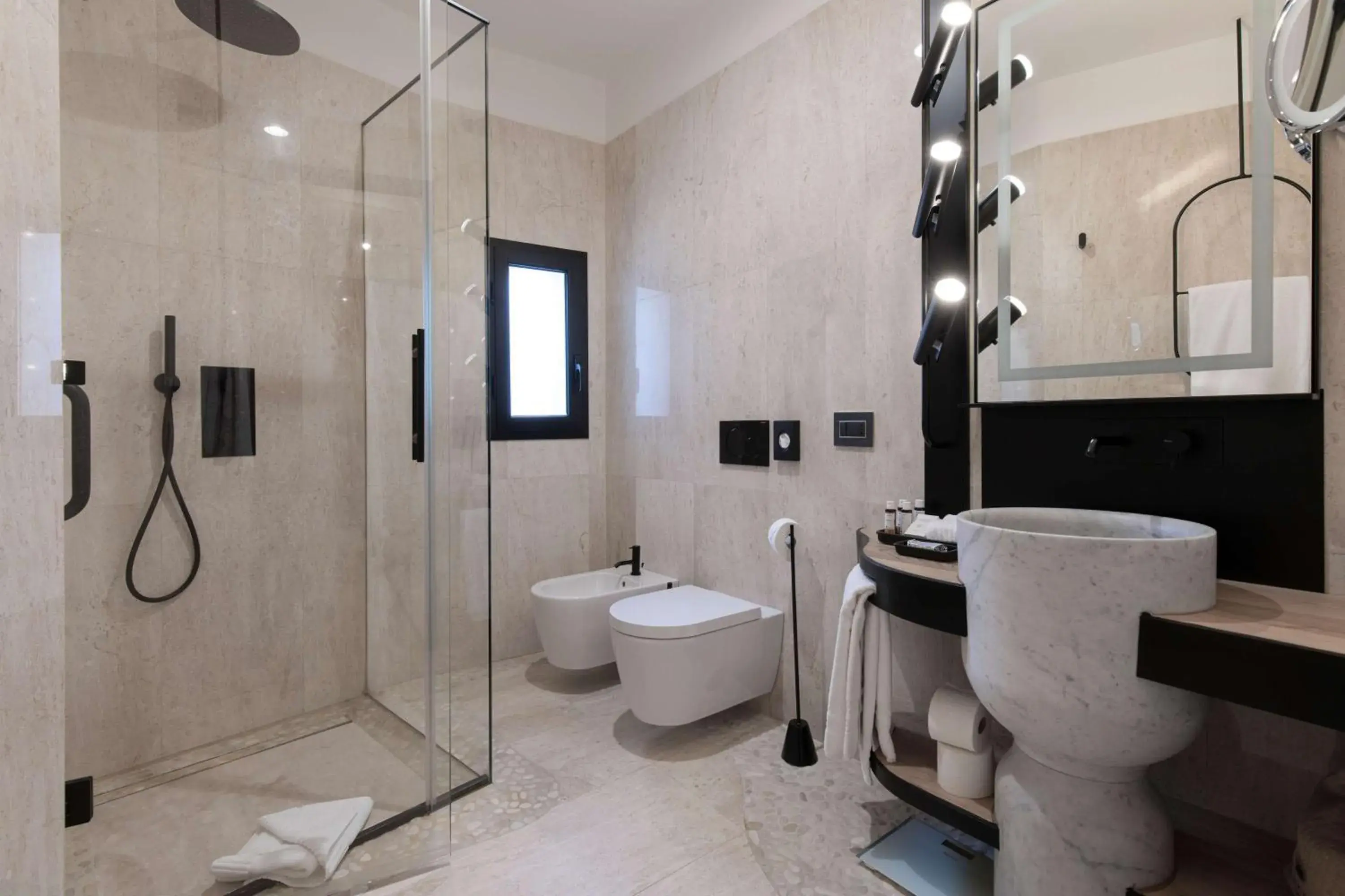 Bathroom in Sulia House Porto Rotondo, Curio Collection by Hilton