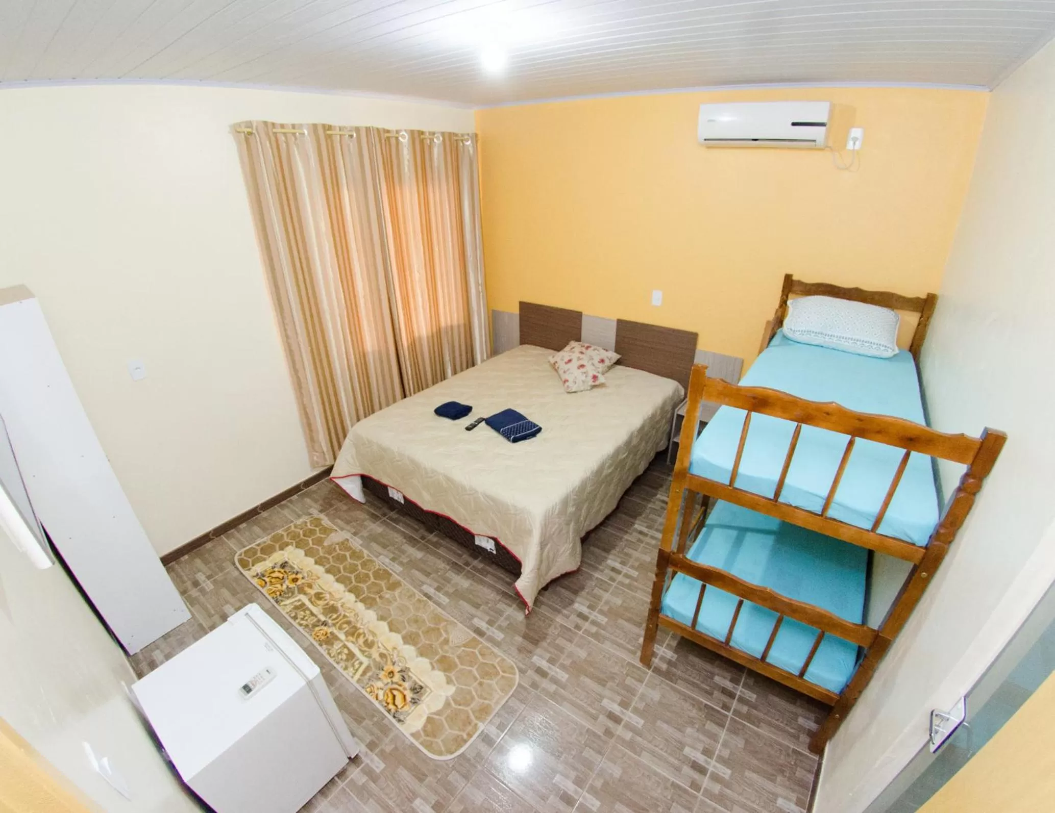 Bed in Pousada Família Cordeiro