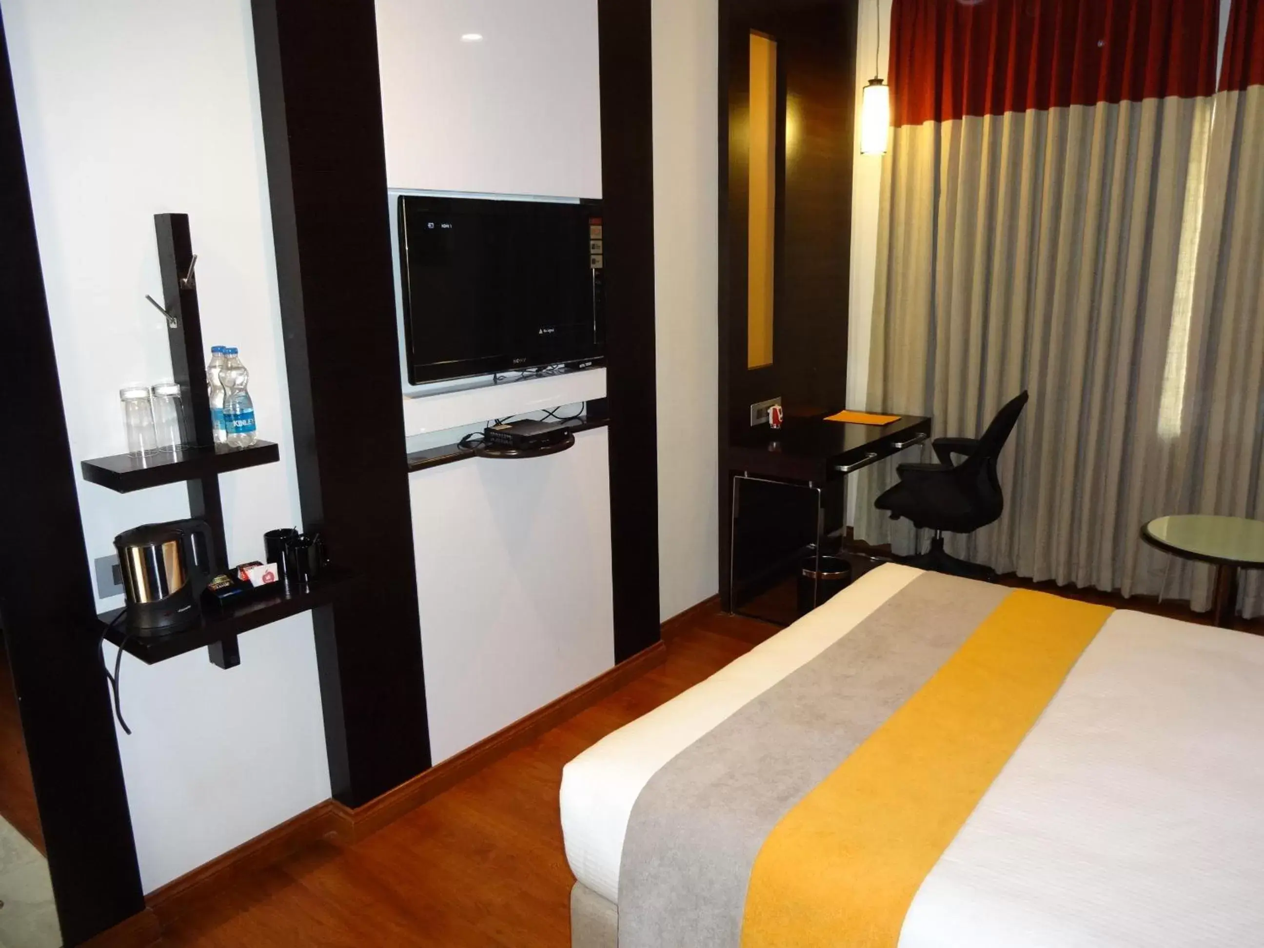 TV and multimedia, TV/Entertainment Center in Astoria Hotels Madurai