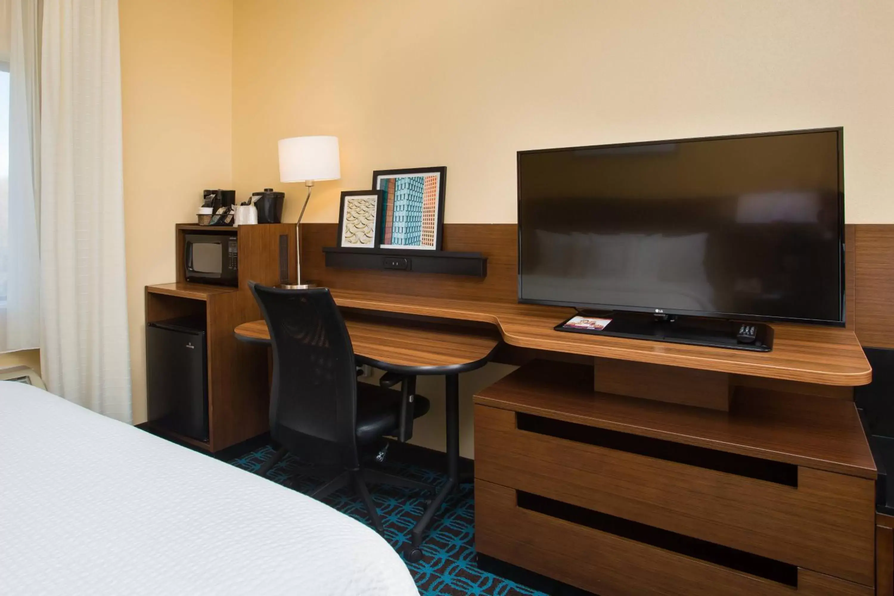Photo of the whole room, TV/Entertainment Center in Fairfield by Marriott Inn & Suites Raynham Middleborough/Plymouth