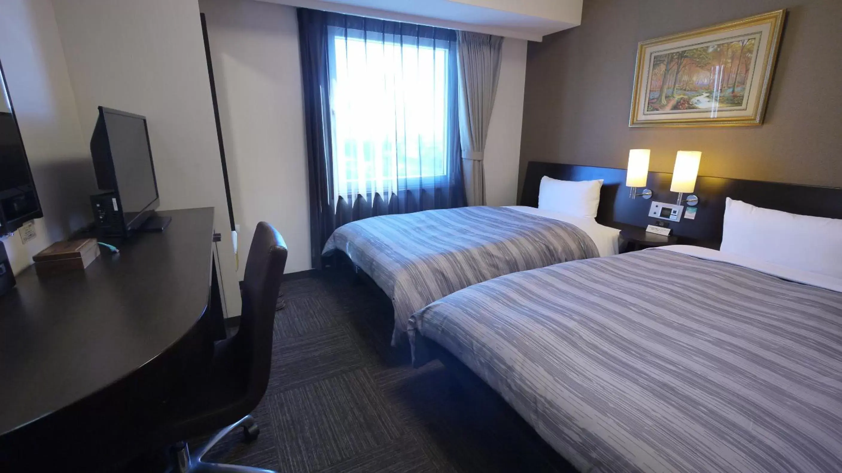 Photo of the whole room, Bed in Hotel Route-Inn Nagahama Inter