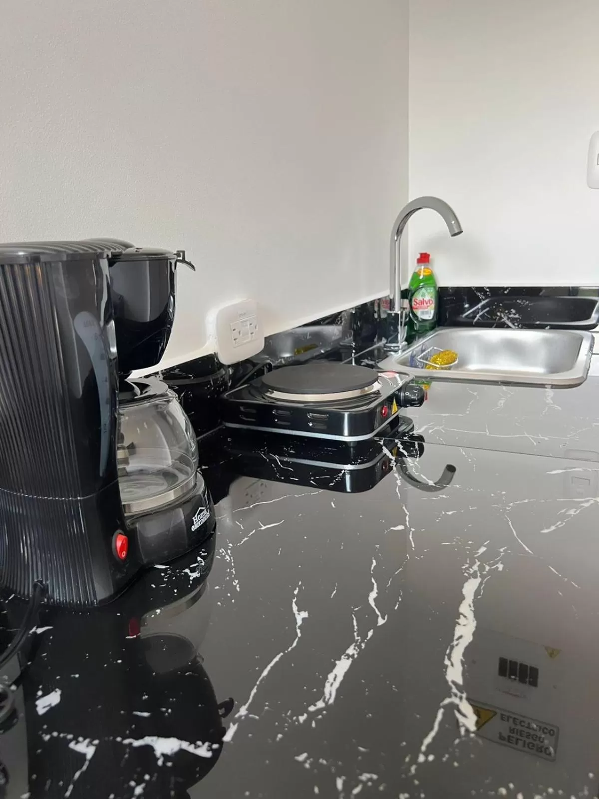 Kitchen or kitchenette in Hotel Boutique Business Center