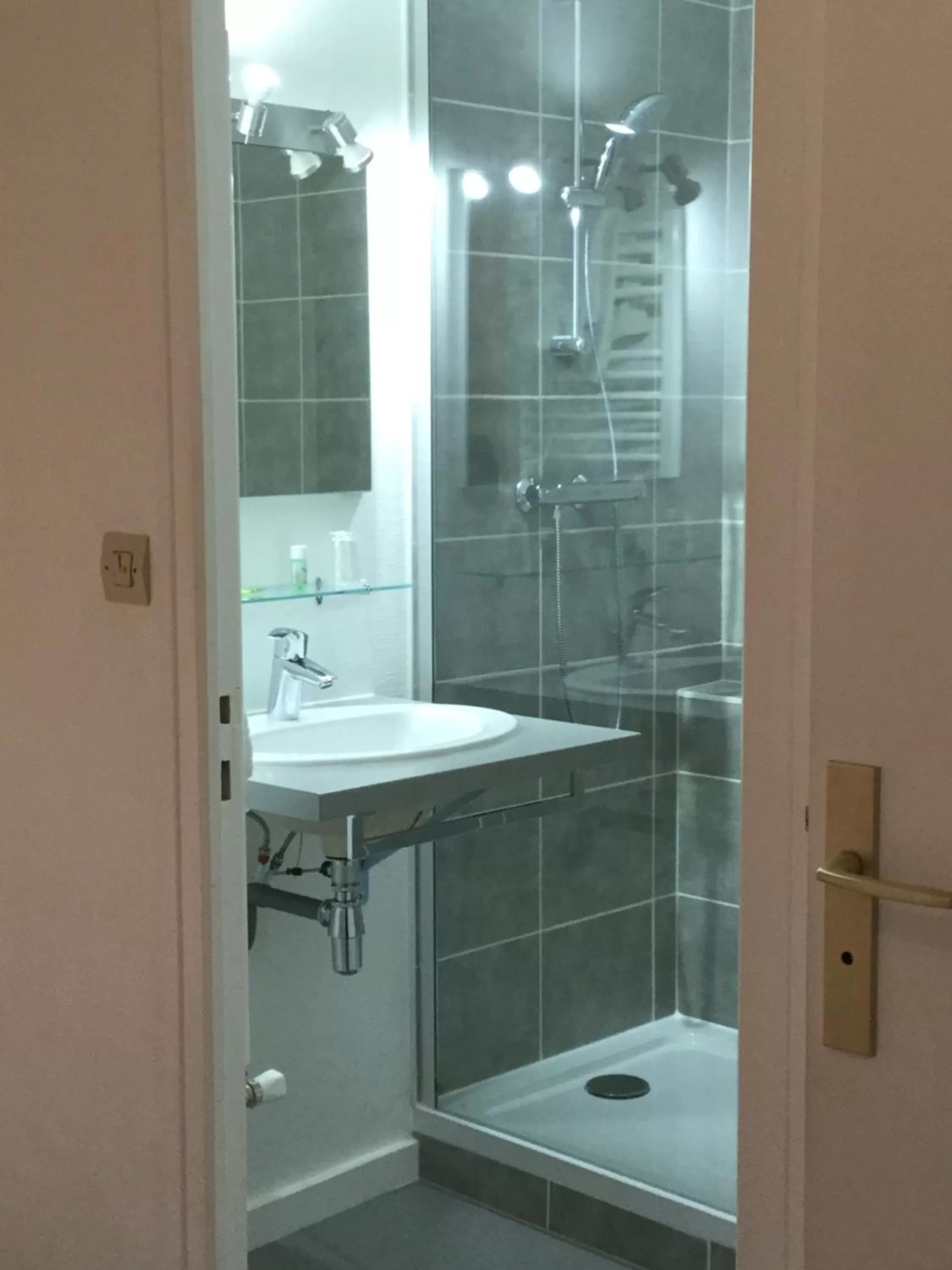 Bathroom in Logis Hôtel Vuillot