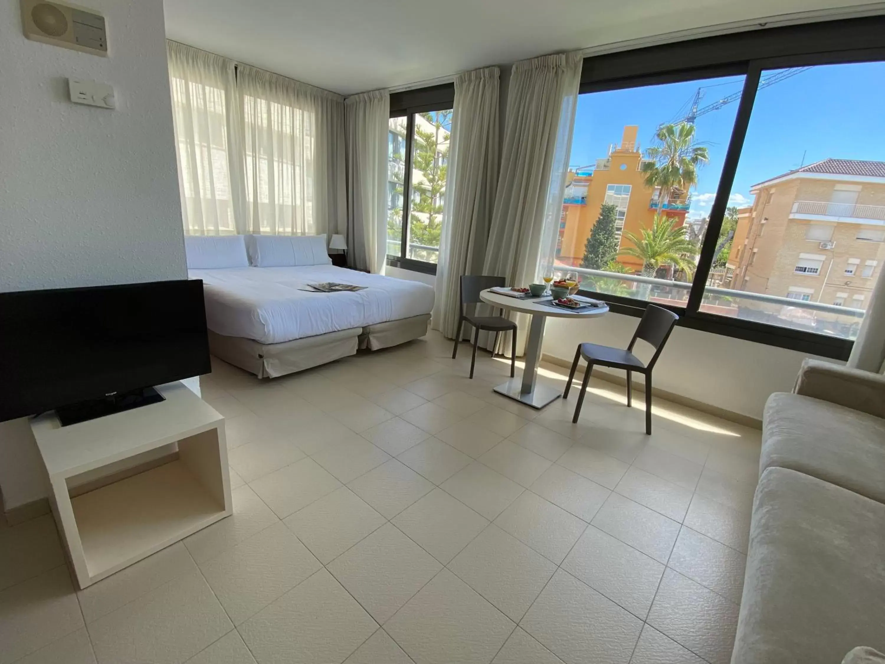 Living room, Bed in Atenea Park Suites & Apartments Living room, Bed in Atenea Park Suites & Apartments