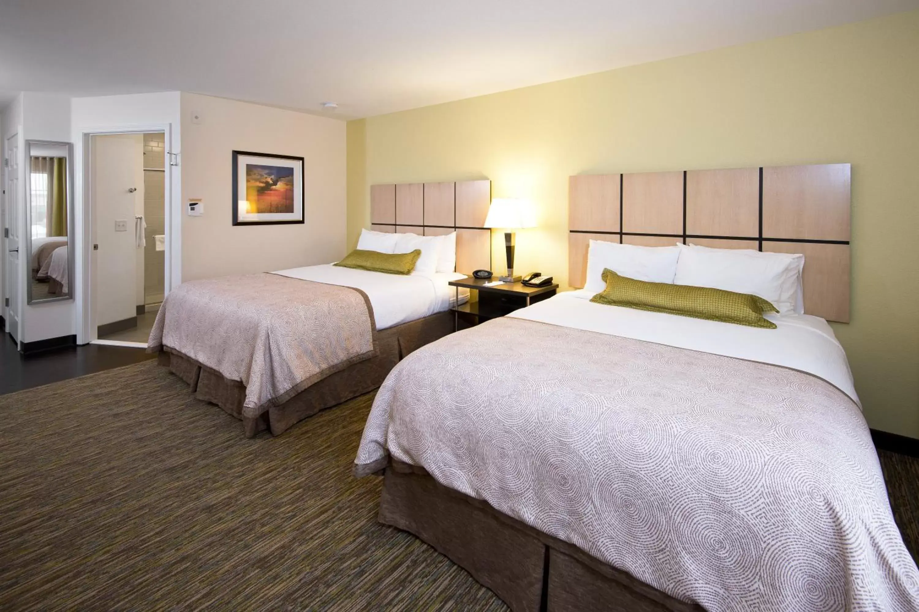 Photo of the whole room, Bed in Candlewood Suites Greeley, an IHG Hotel