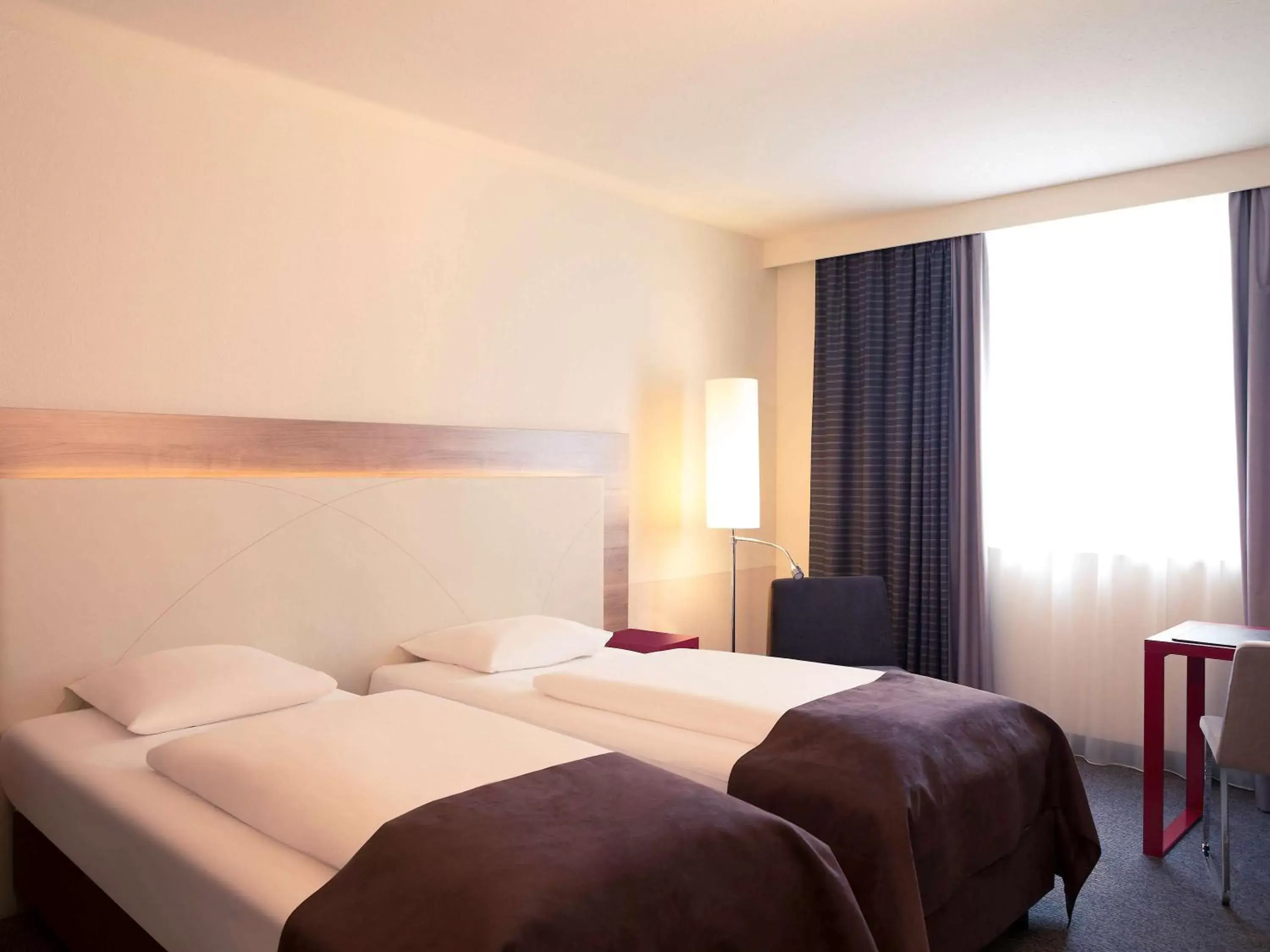 Photo of the whole room, Bed in Mercure Hotel Stuttgart Airport Messe