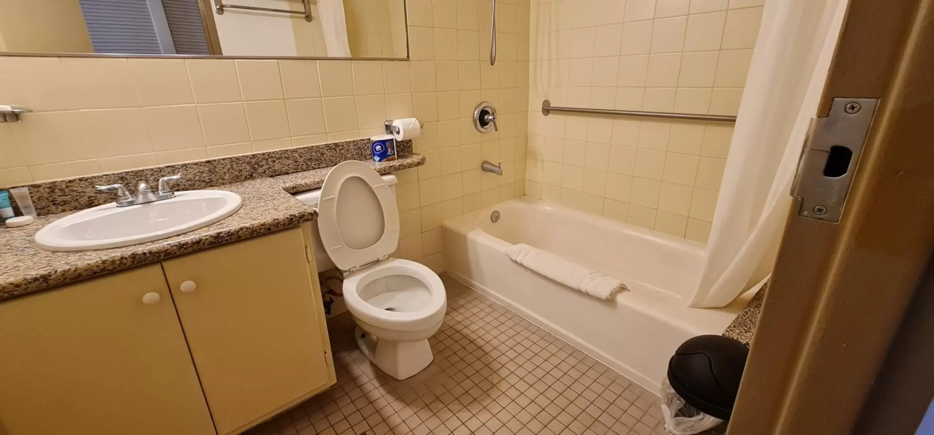 Bathroom in SureStay Hotel by Best Western Guam Palmridge