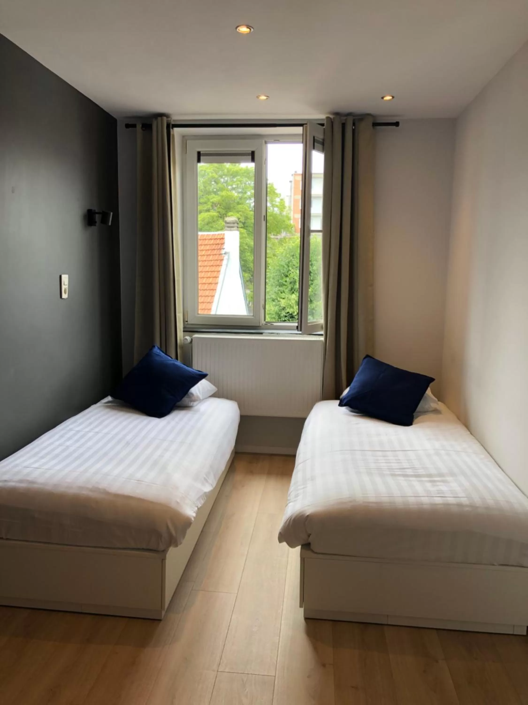 Bed in Hotel Le Cygne d'Argent