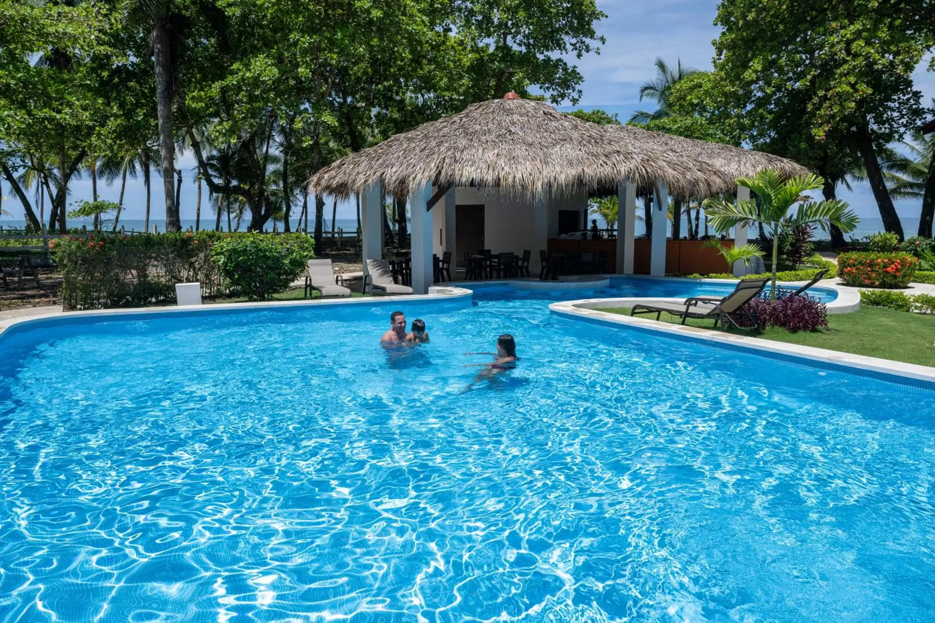 group of guests, Swimming Pool in Fuego del Sol Beachfront Hotel