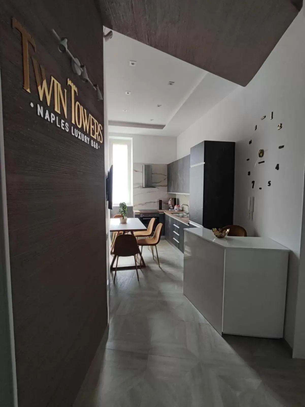 Communal kitchen in Twin Towers Naples Luxury