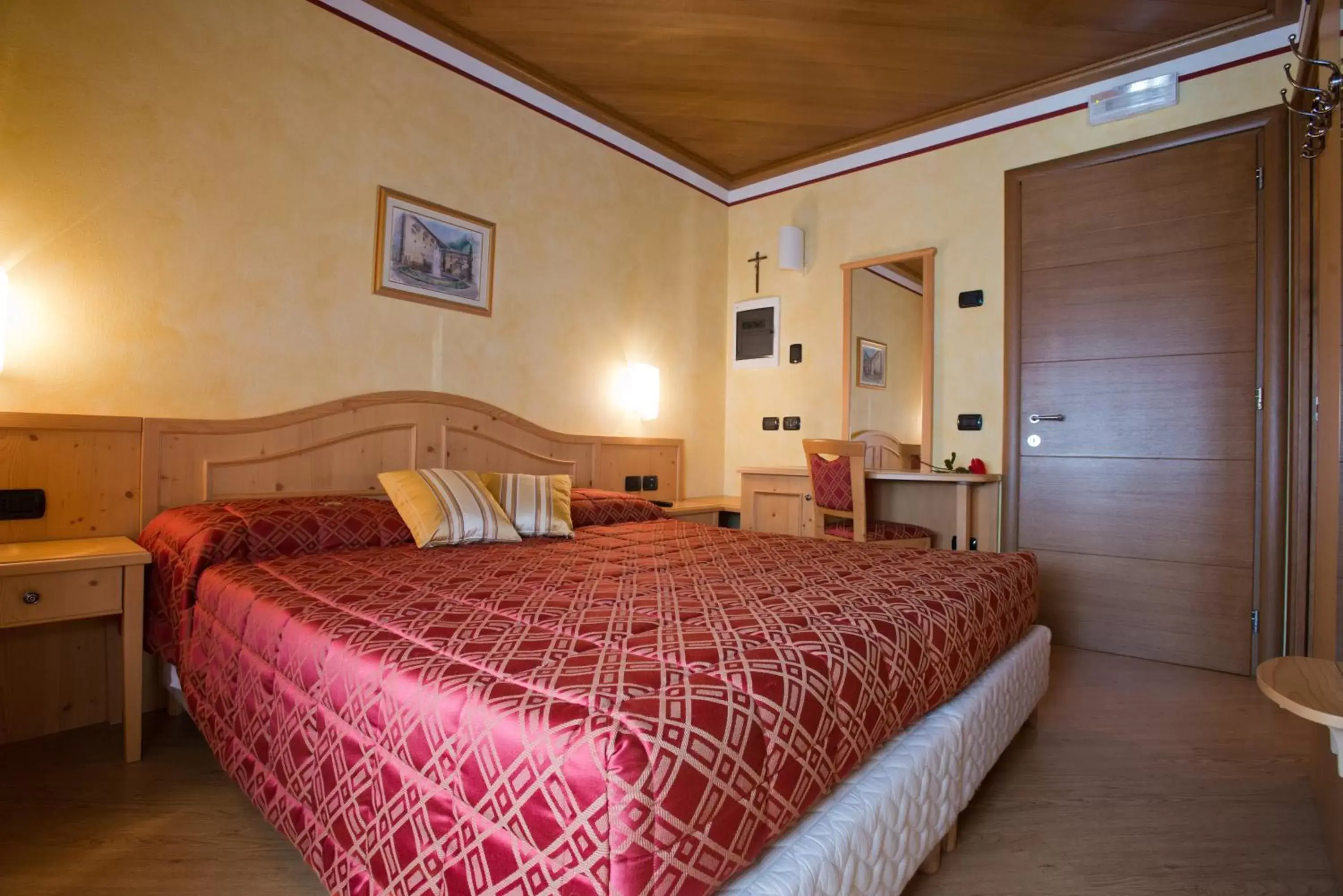 Bed in Hotel Garni Le Corti