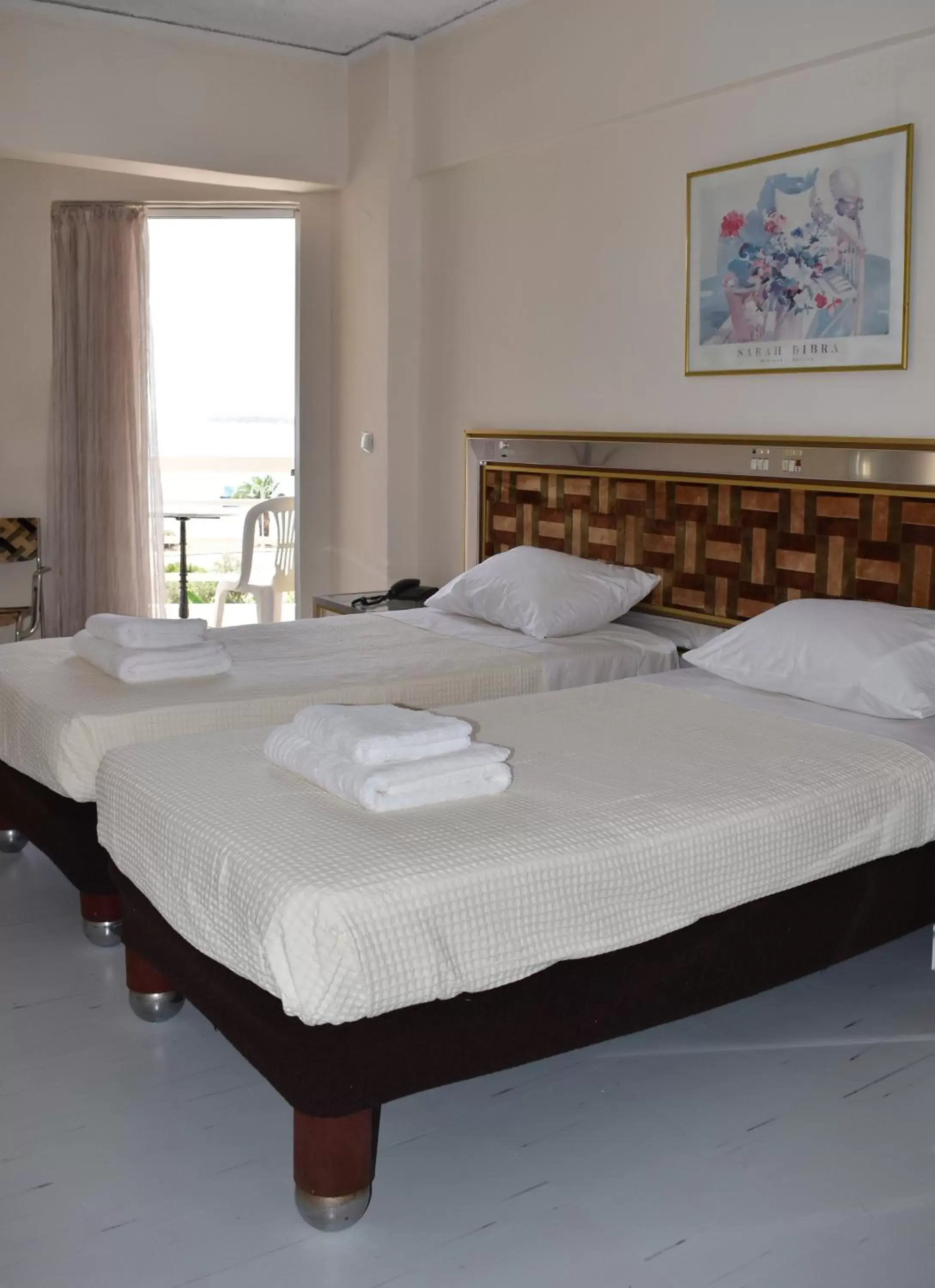 Bed in Hotel Theoxenia