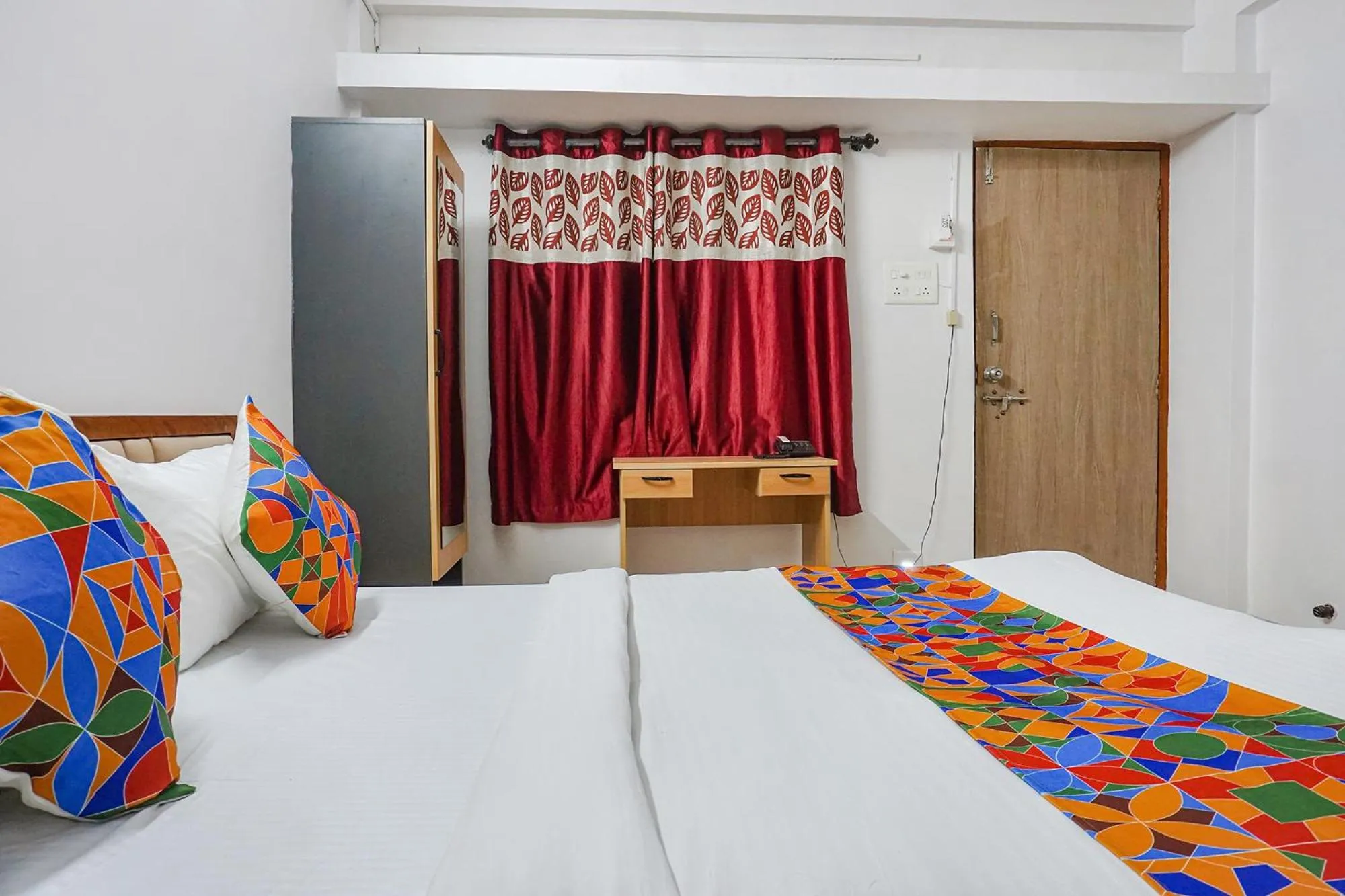 Bed in FabHotel Lake View - Chinmaya Vitthal Mandir