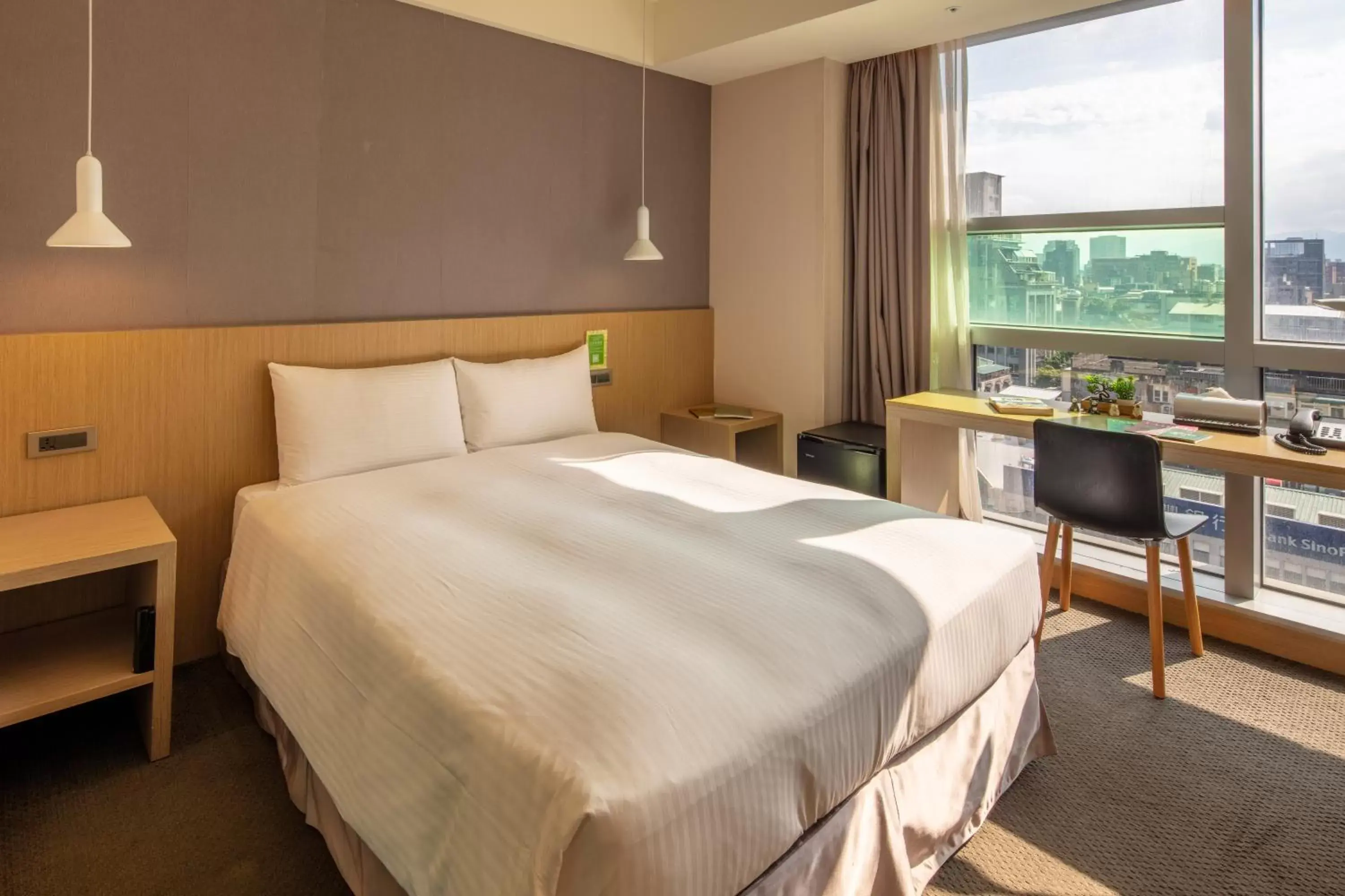 Photo of the whole room, Bed in Chaiin Hotel - Dongmen Photo of the whole room, Bed in Chaiin Hotel - Dongmen