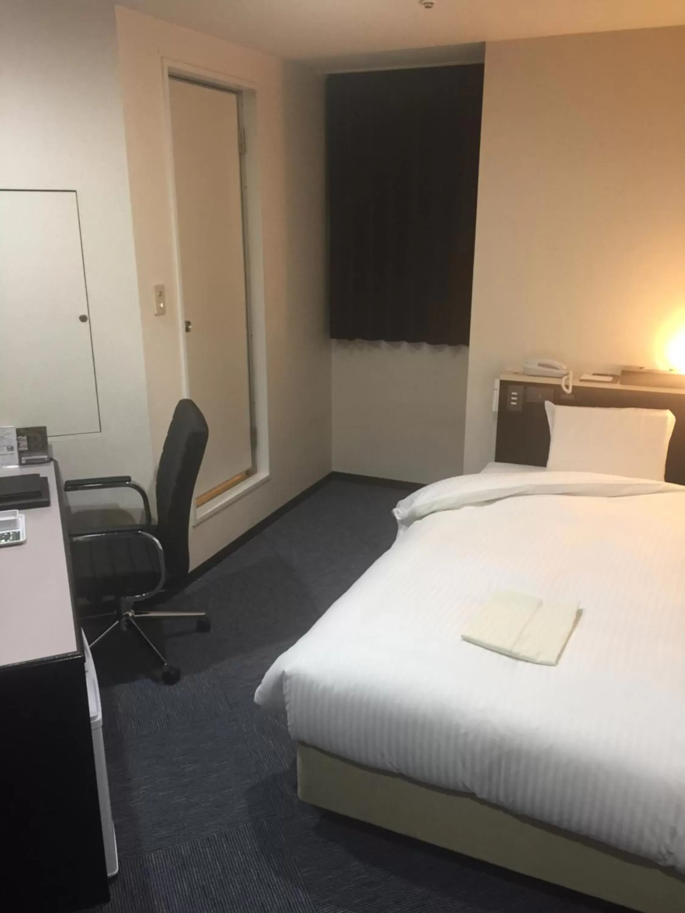 Photo of the whole room, Bed in R Hotels Inn Hokkaido Asahikawa