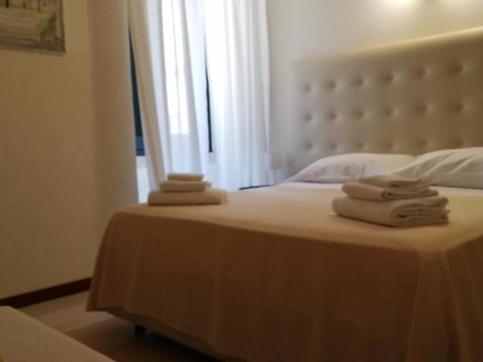Bed in Landolina Palace Hotel