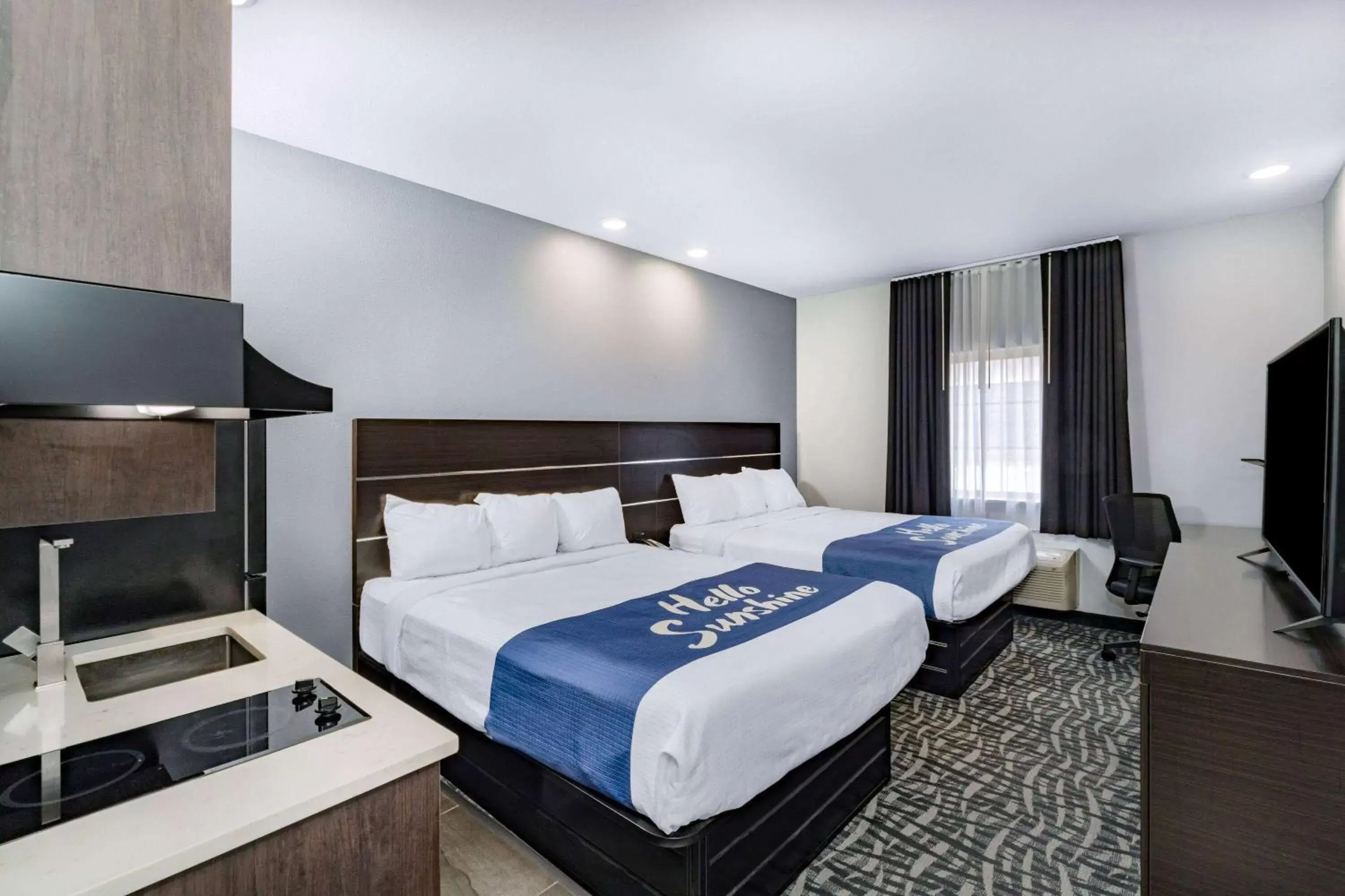 Photo of the whole room, Bed in Days Inn & Suites by Wyndham Horn Lake - Memphis Graceland