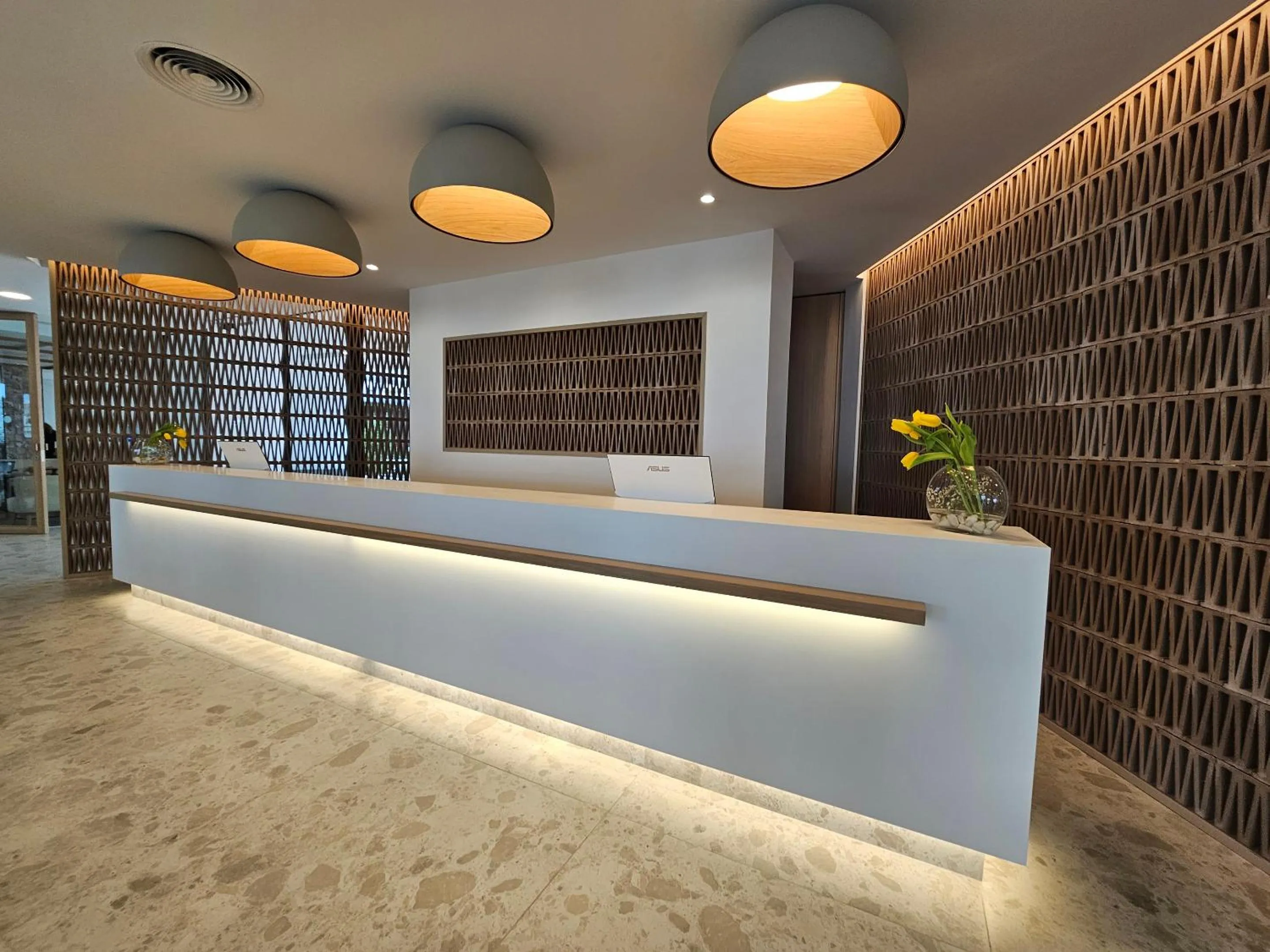 Lobby or reception in Hotel & Spa S'Entrador Playa