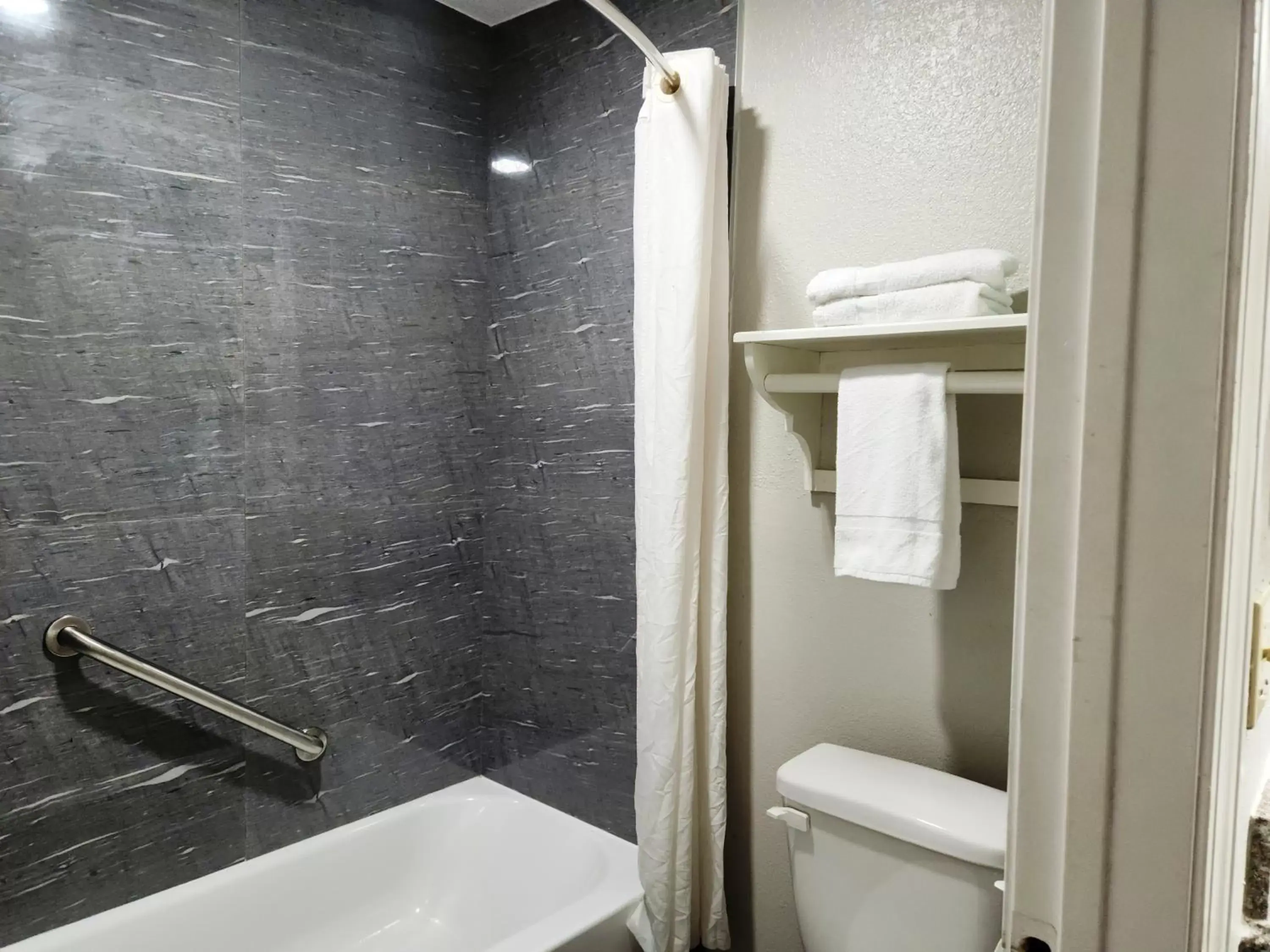 Shower, Bathroom in Express Inn Hobby Airport