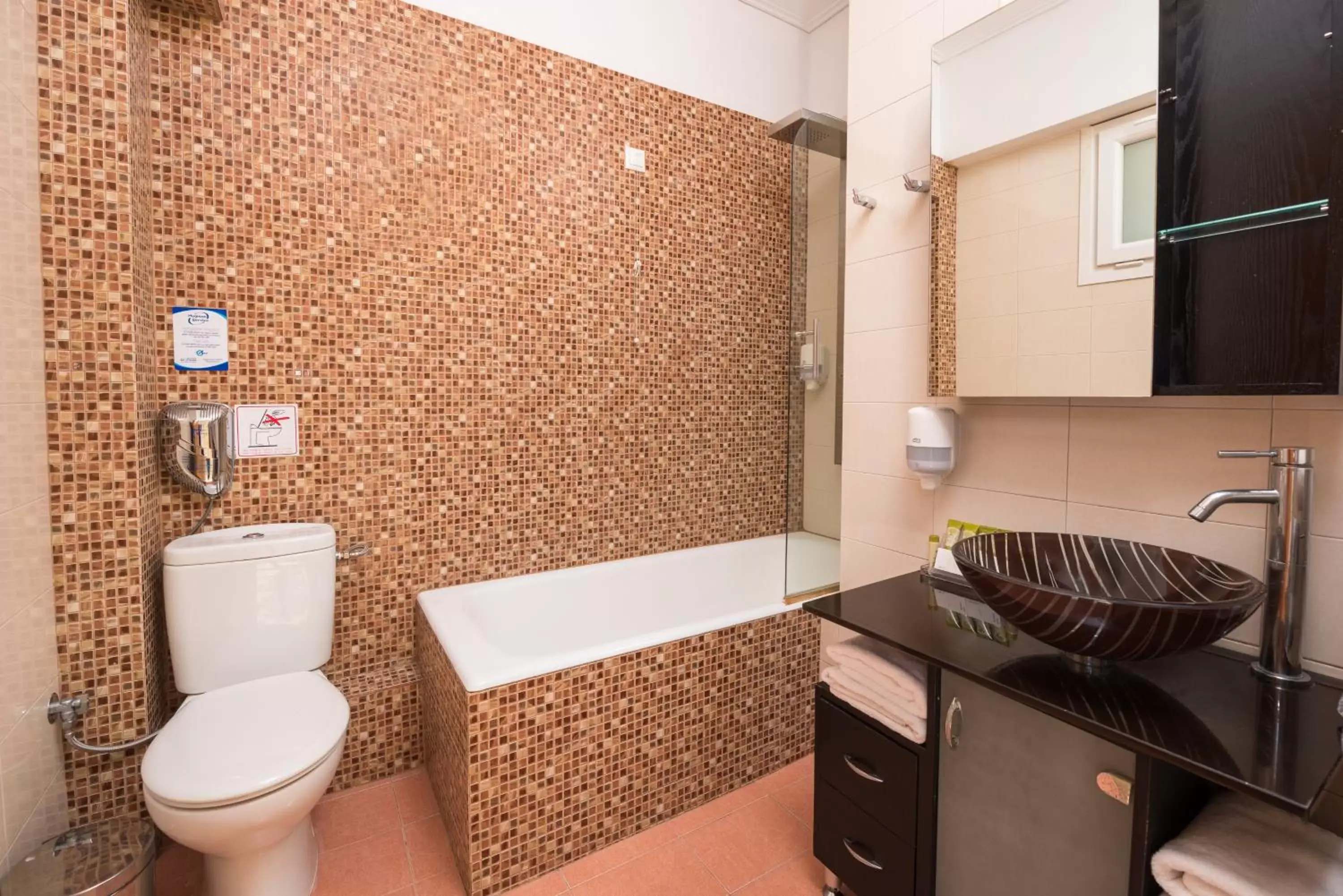 Toilet, Bathroom in Heliotrope Hotels