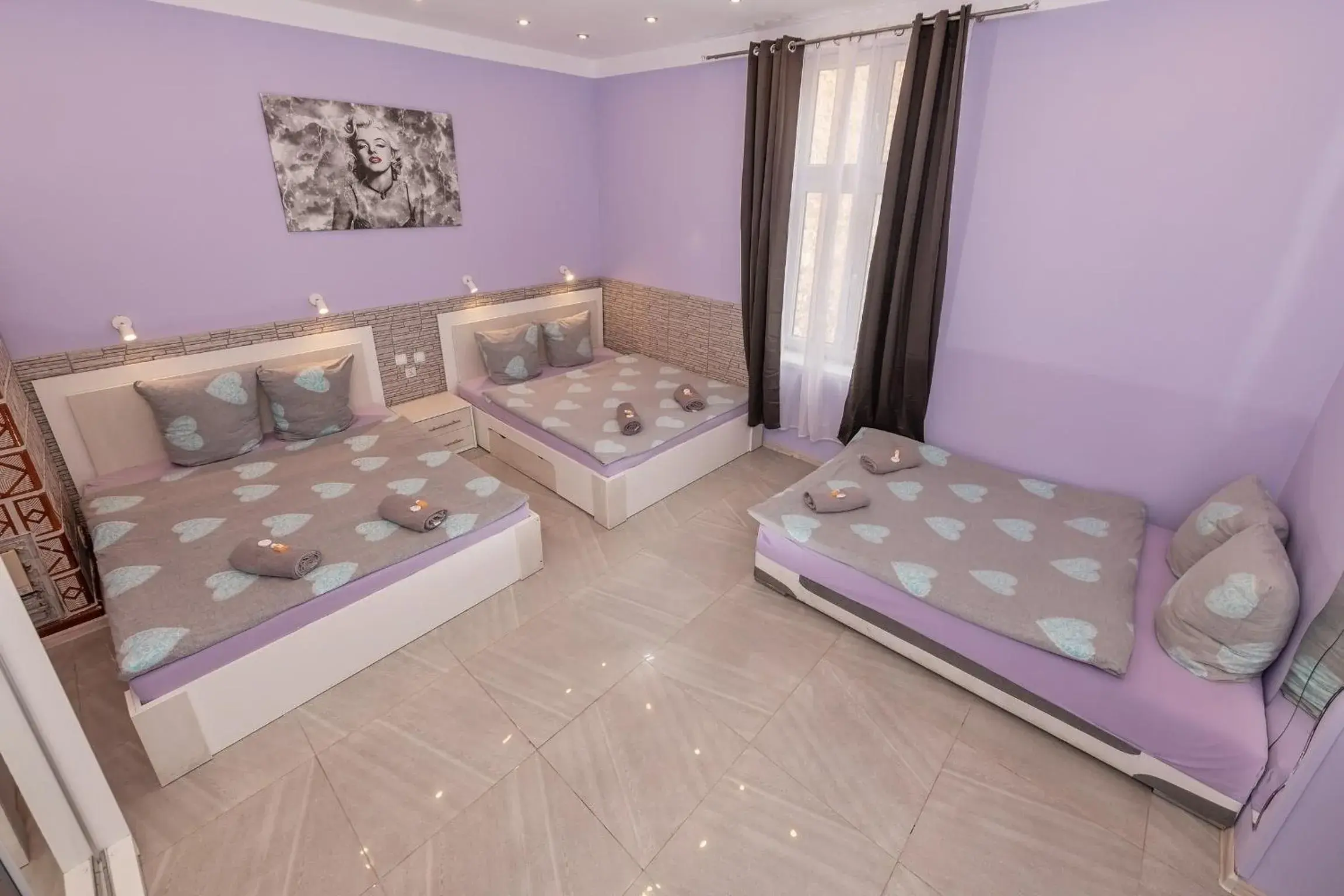 Bed in Queen Apartments Bed in Queen Apartments