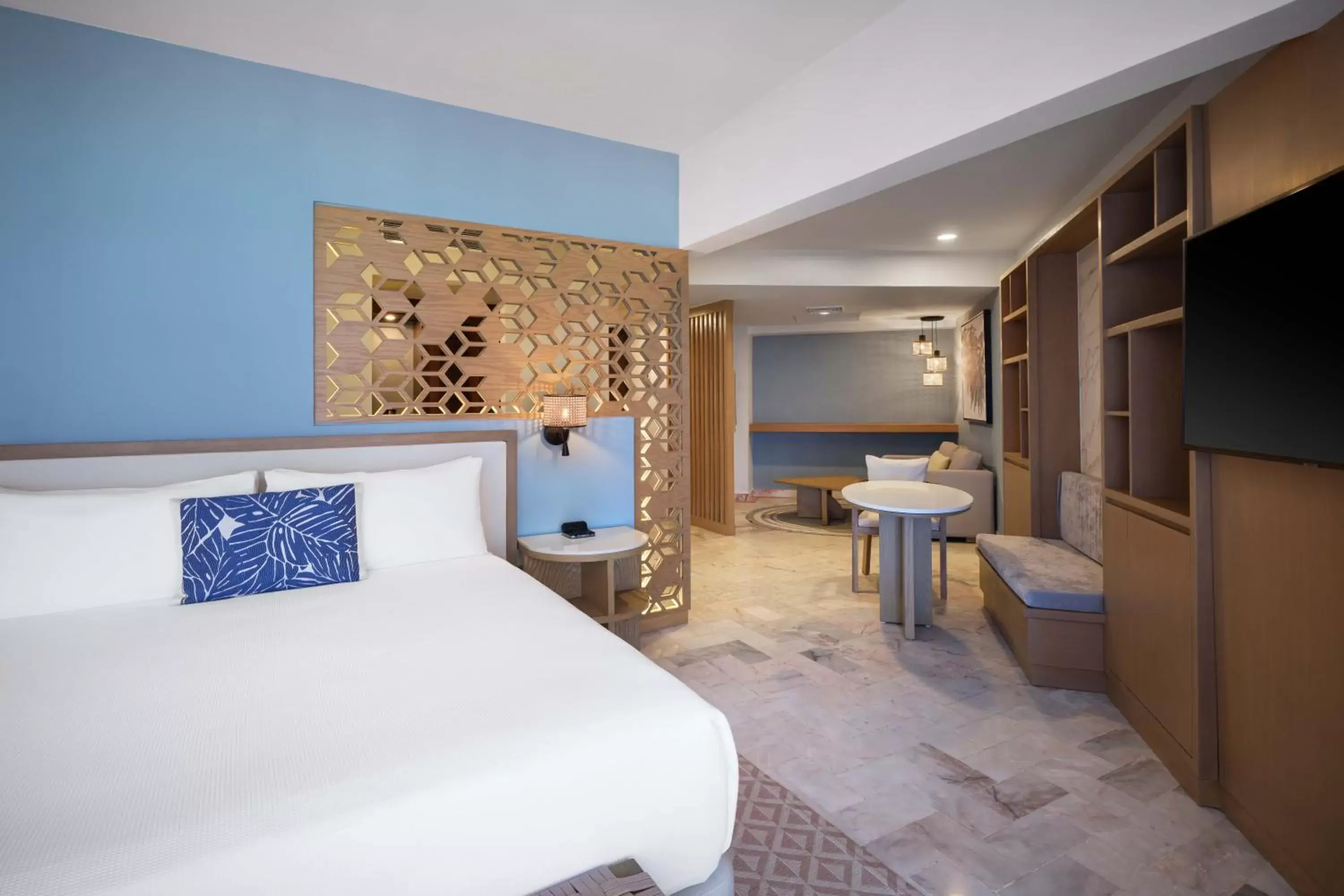 Bed in Wyndham Grand Cancun All Inclusive Resort & Villas