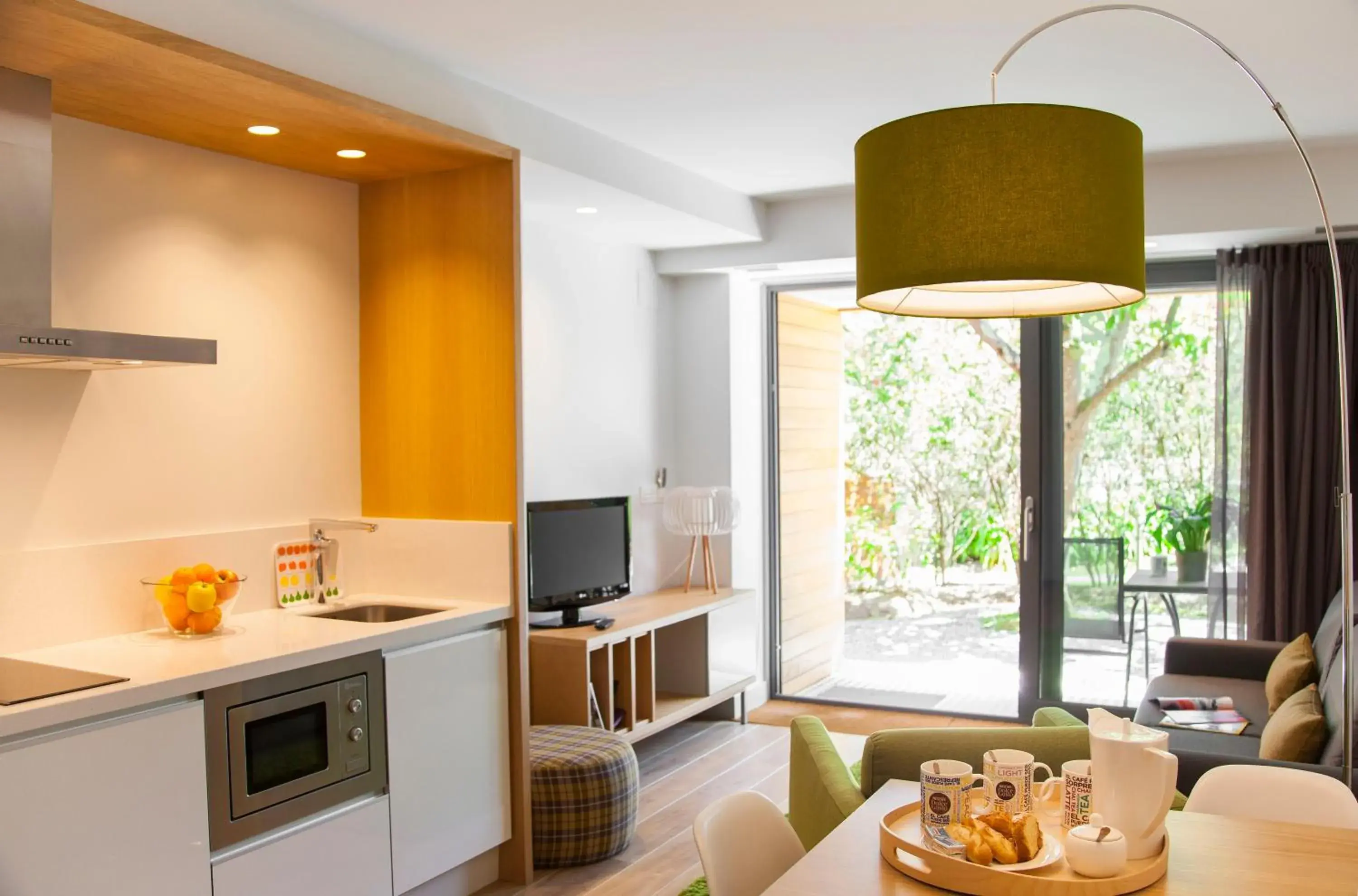 Dining area, Kitchen/Kitchenette in Casona de la Paca Apartments