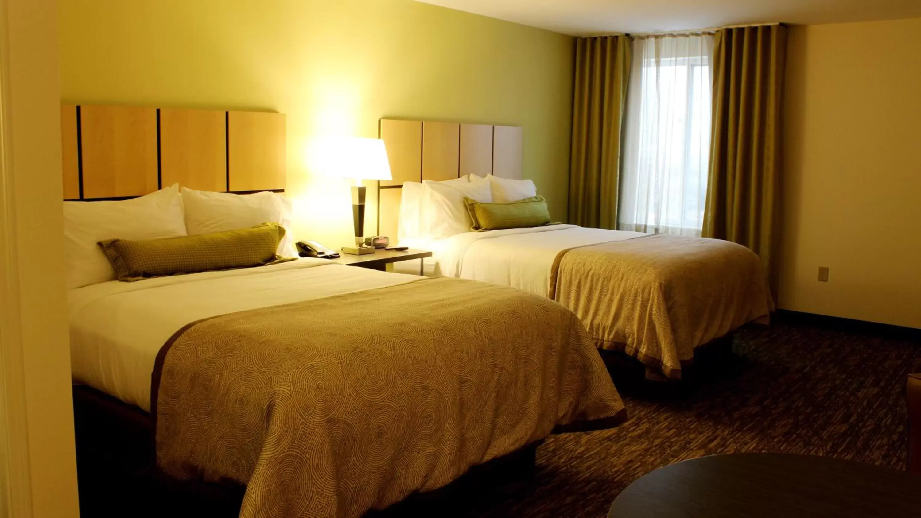 Photo of the whole room, Bed in Candlewood Suites Sioux City - Southern Hills, an IHG Hotel