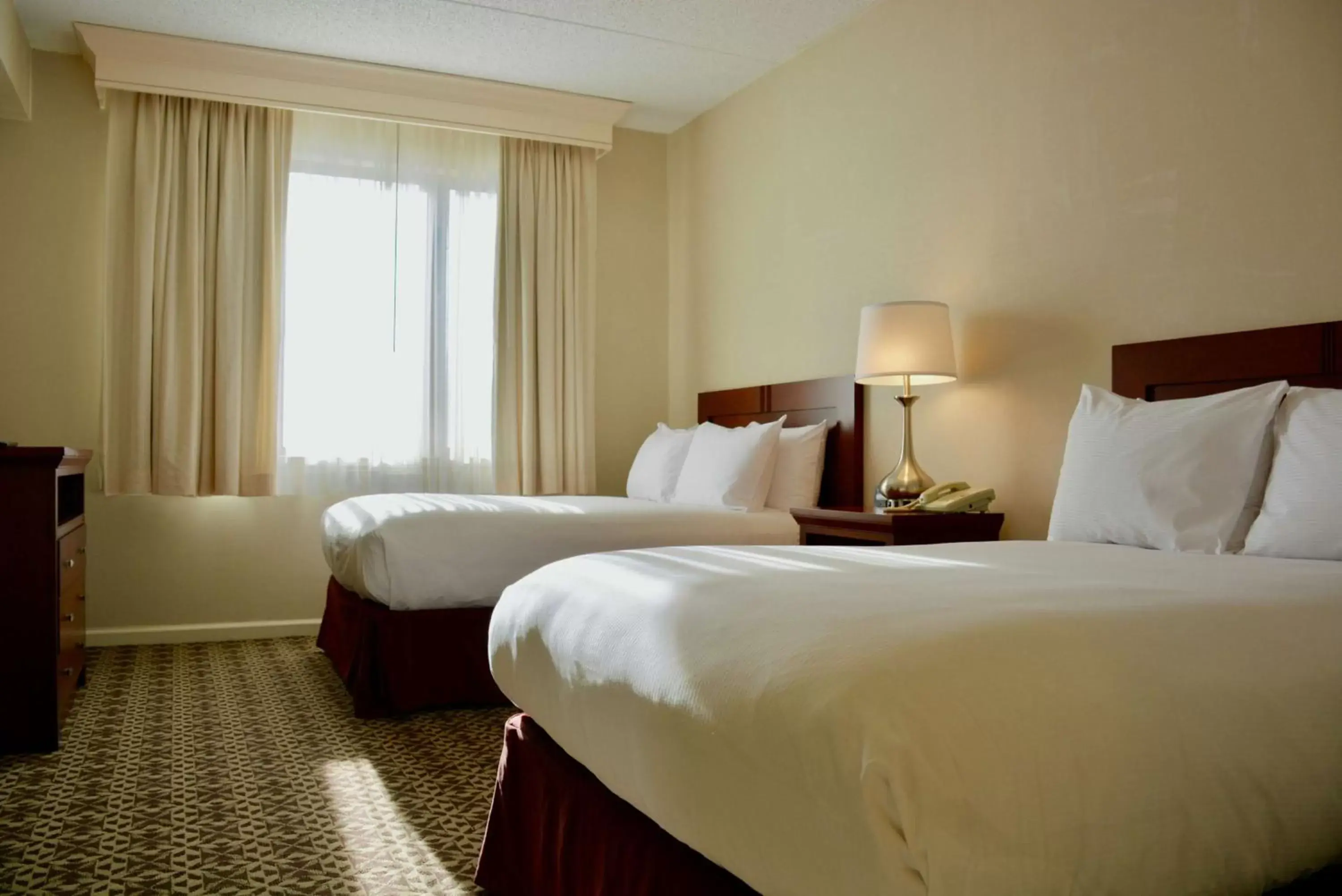 Bed in DoubleTree Suites by Hilton Mount Laurel