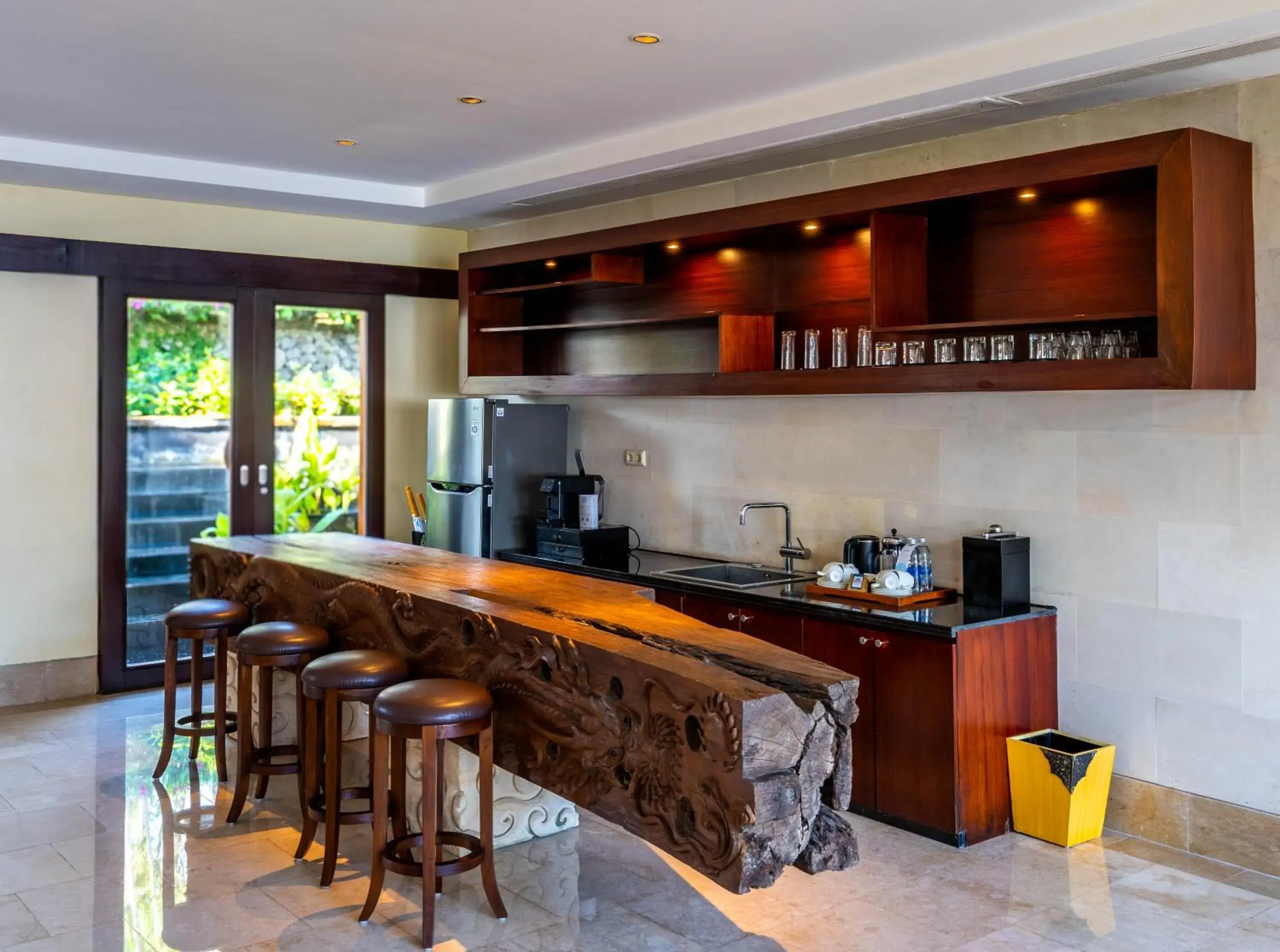 Kitchen or kitchenette, Lounge/Bar in AYANA Villas Bali