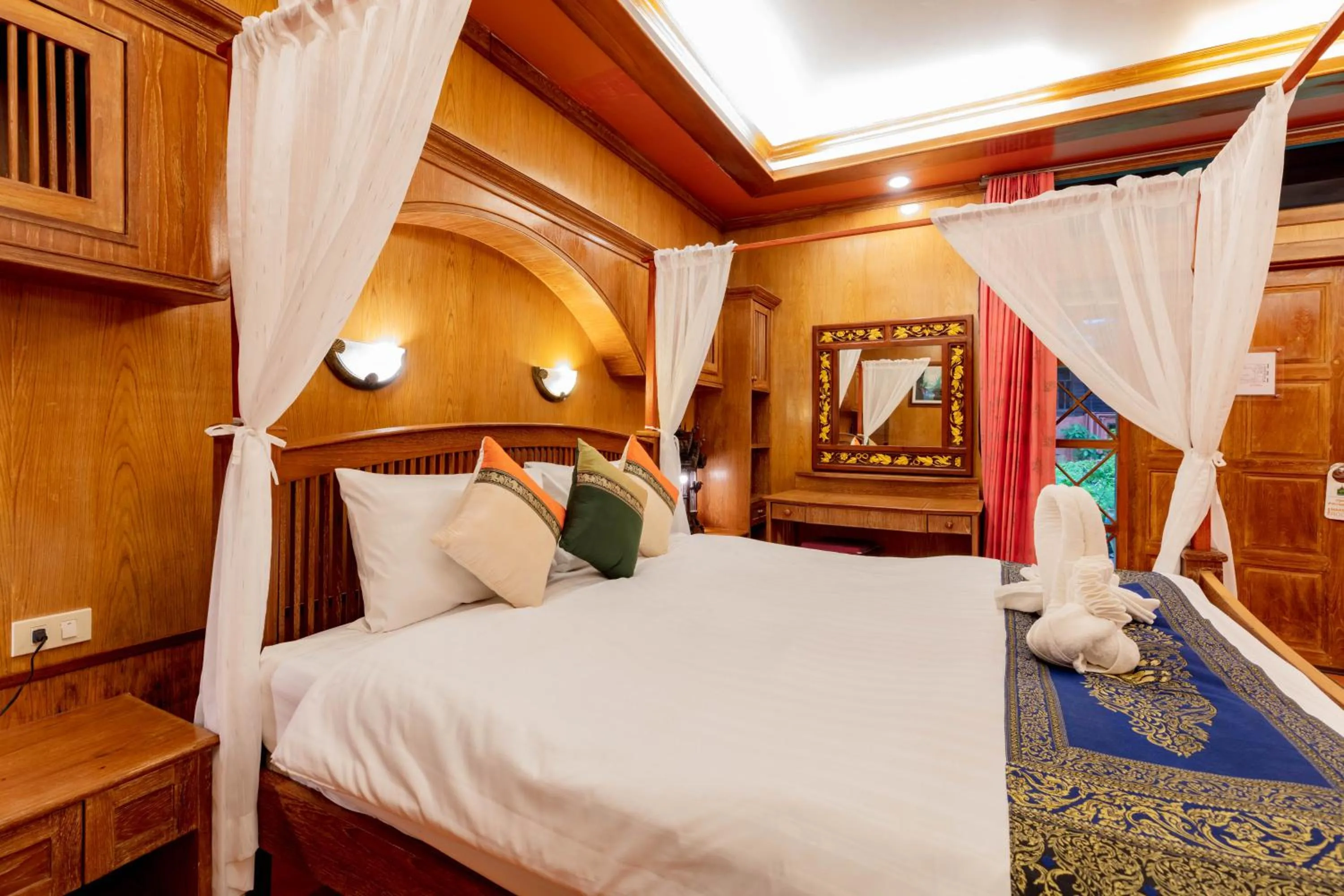Bedroom, Bed in Royal Phawadee Village Patong - 2 Minutes walk to the beach