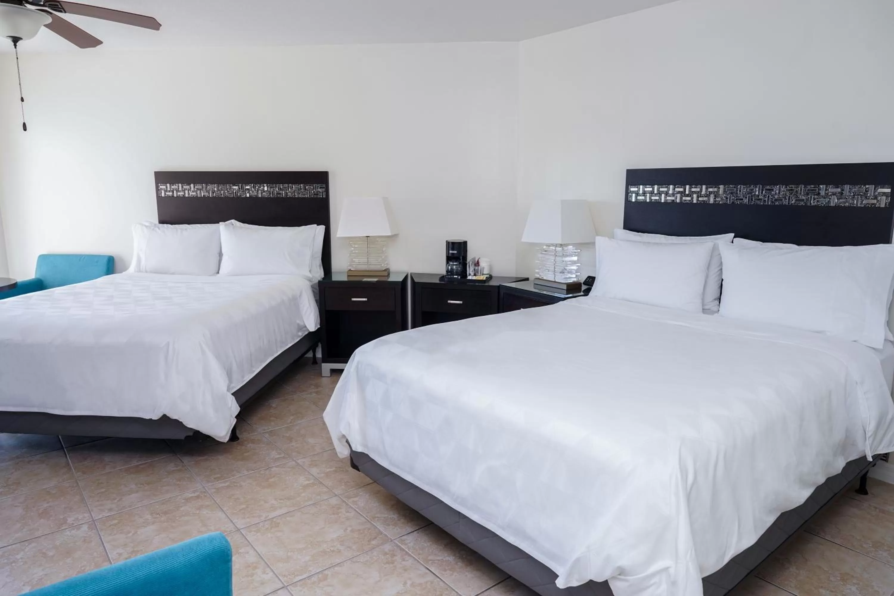 Bed in Holiday Inn Resort Grand Cayman by IHG