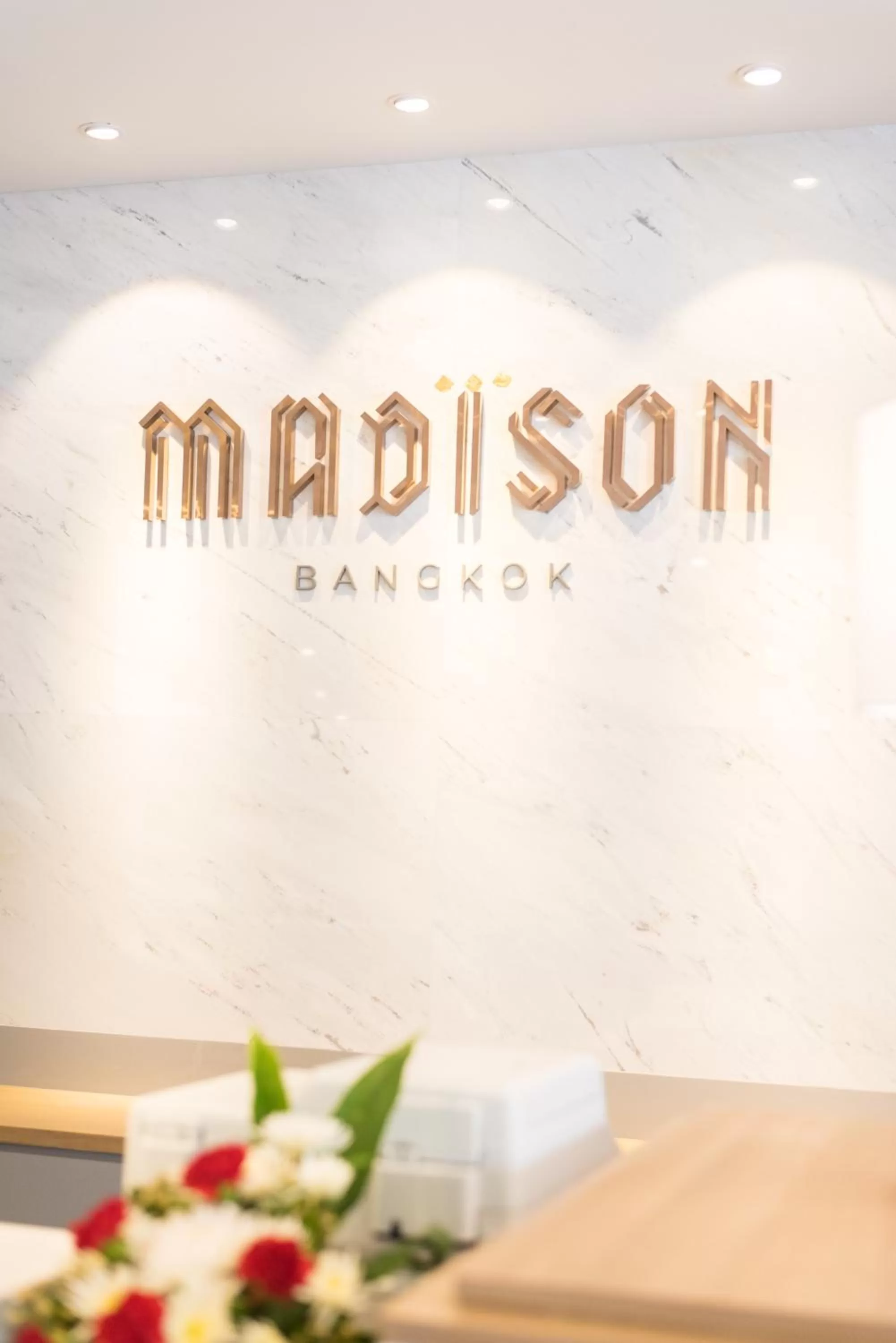 Property logo or sign in Madison Bangkok Hotel