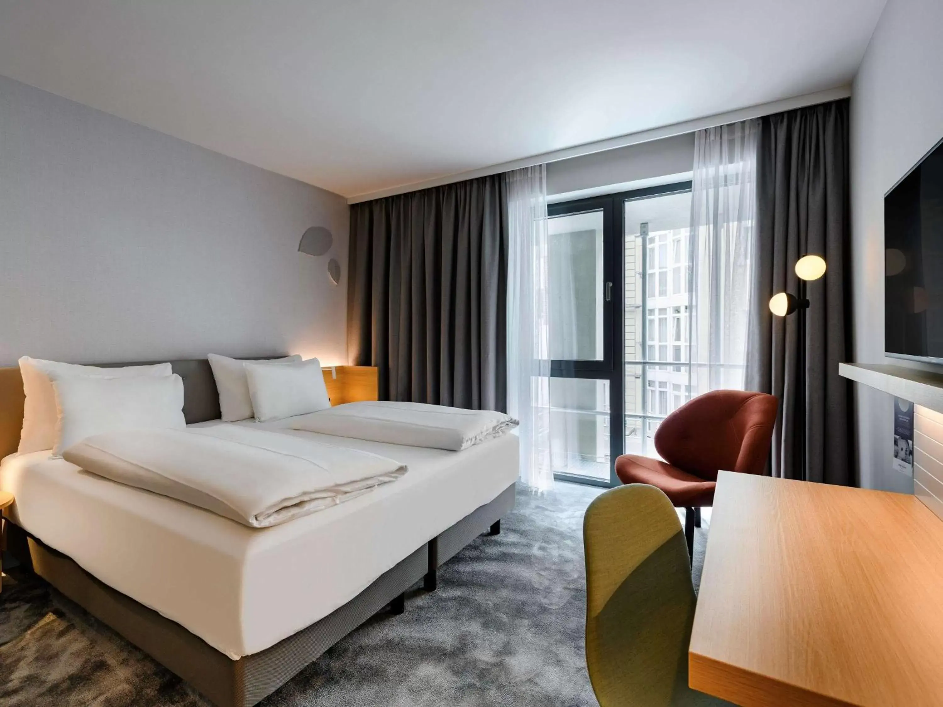 Photo of the whole room, Bed in Mercure Hotel München-Schwabing