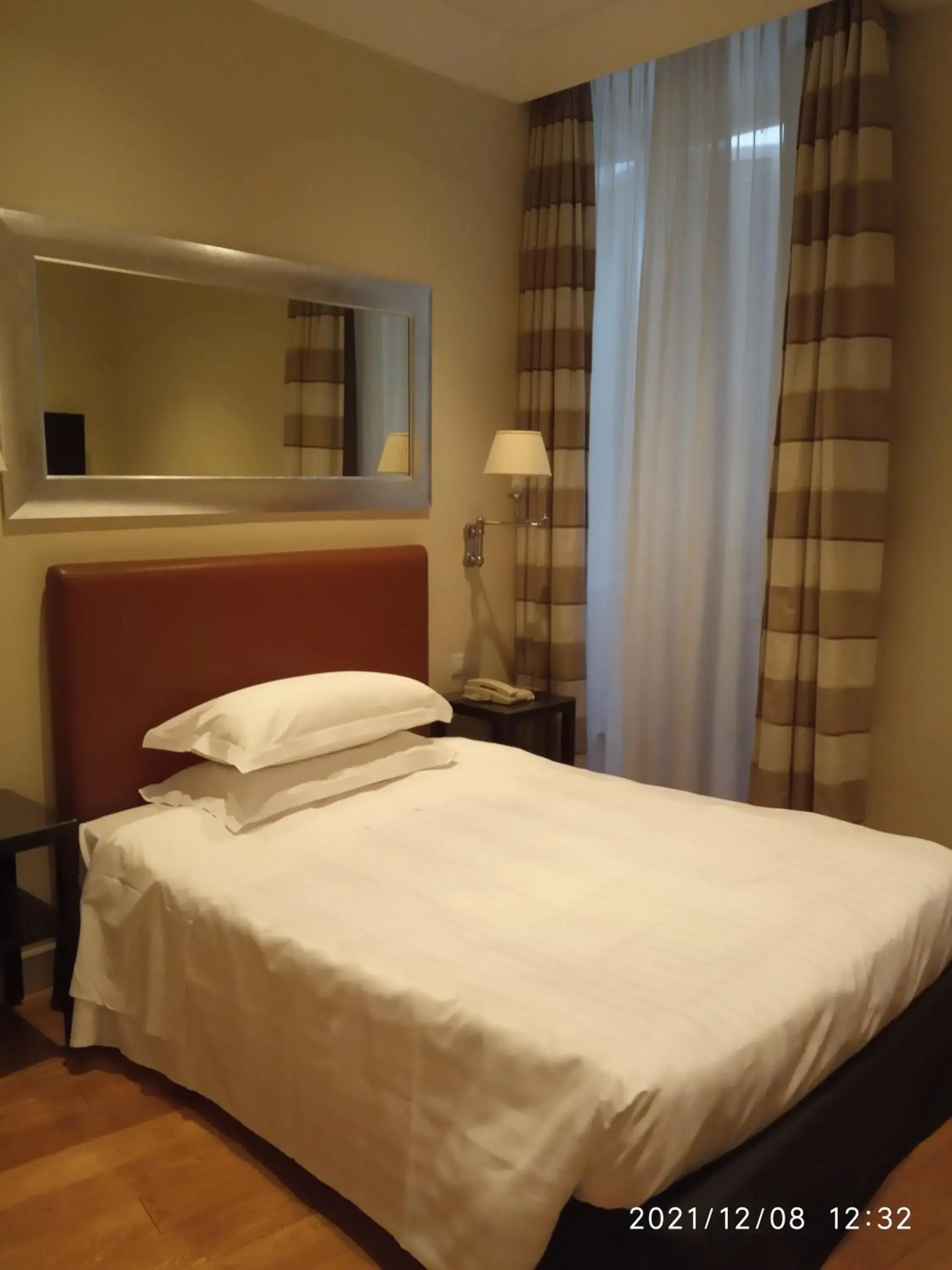 Bed in Hotel Albergo Santa Chiara