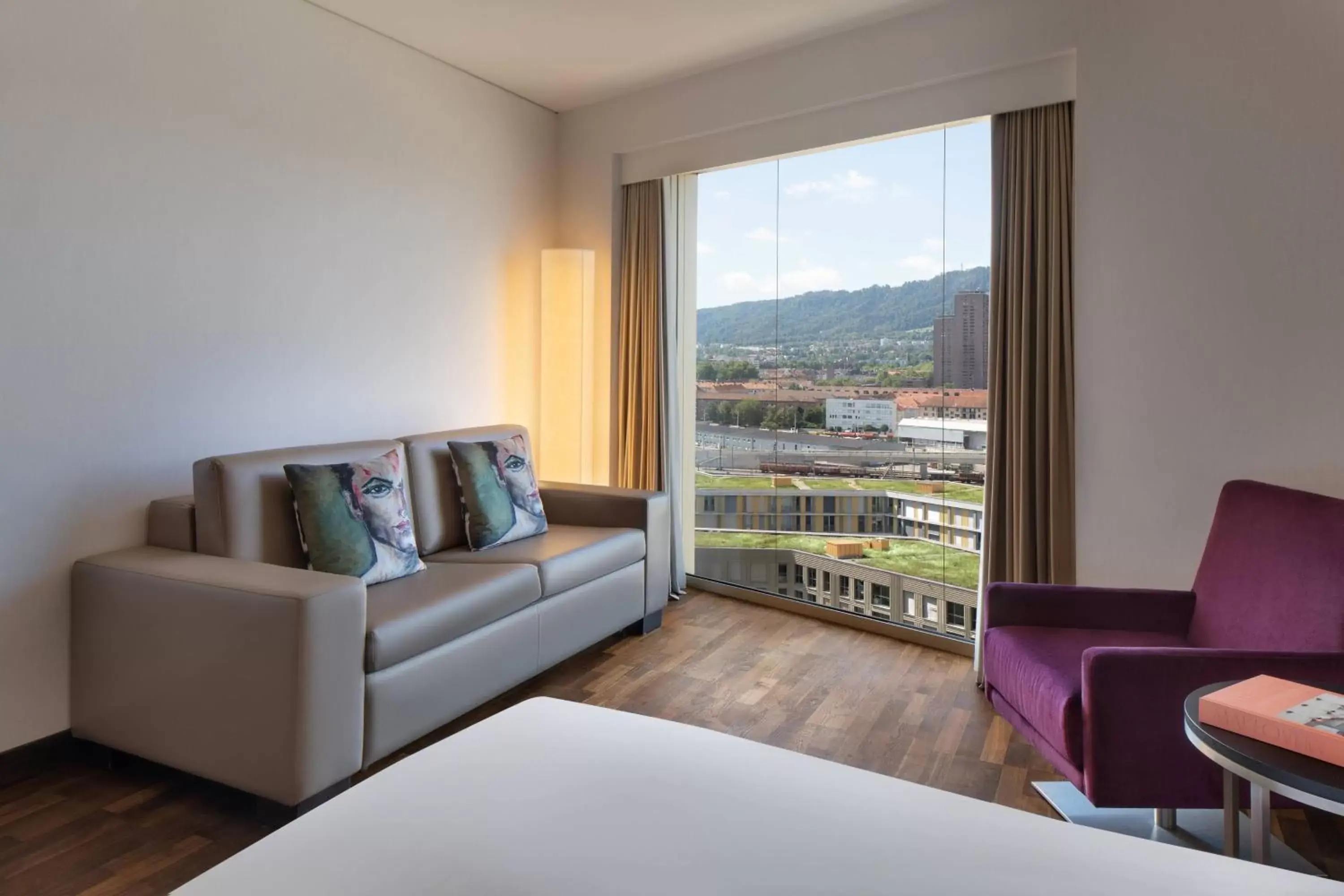 Photo of the whole room, Seating Area in Renaissance Zurich Tower Hotel