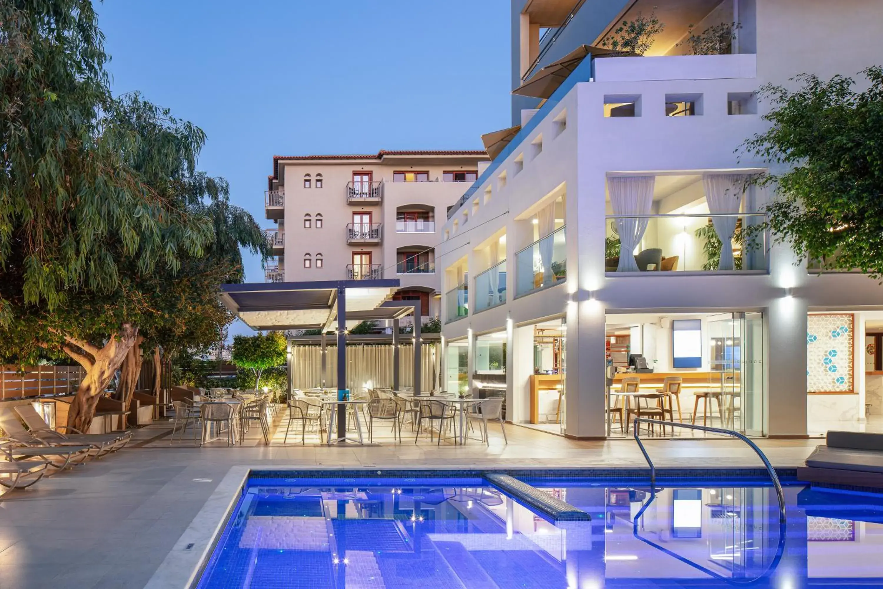 Property building, Swimming Pool in Atrium Ambiance Hotel